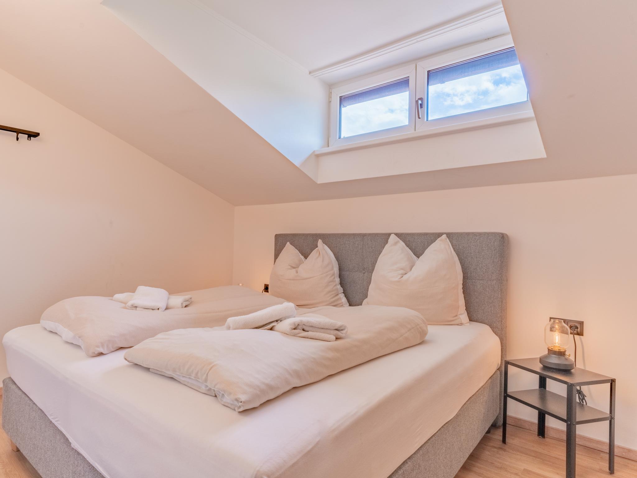 Bedroom with comfortable beds at Tirola Stadl Vroni Hansl in Hopfgarten im Brixental