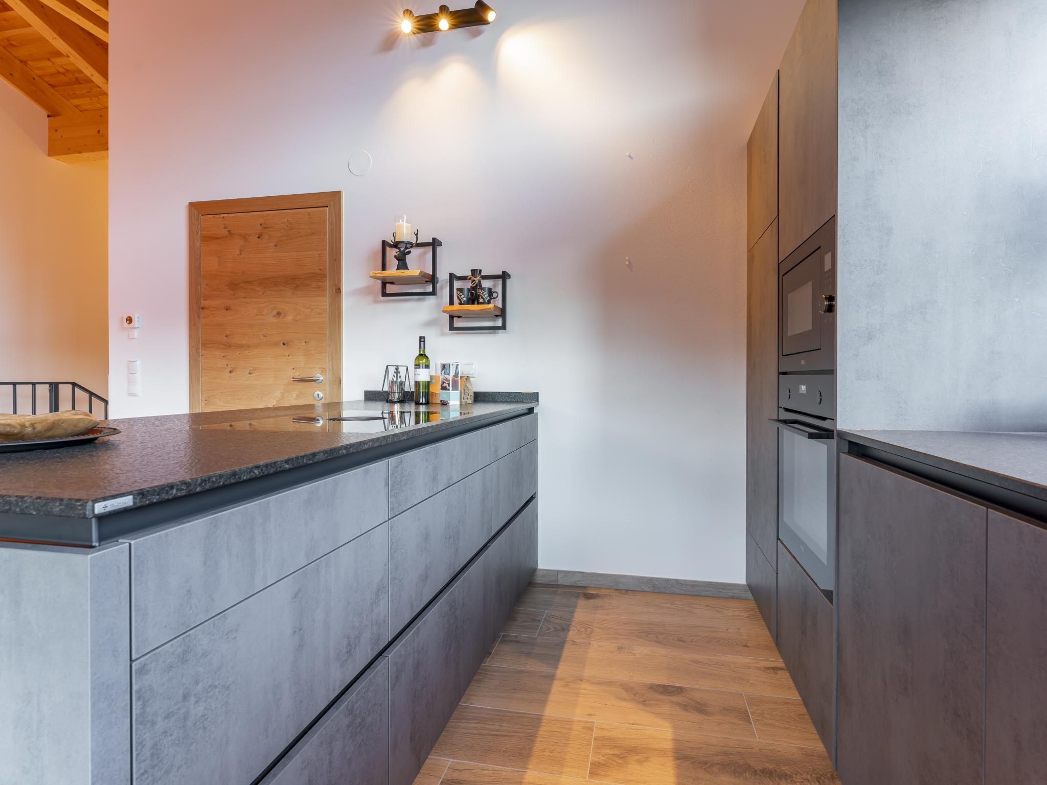 Bedroom with comfortable beds at Grebenzen Lodge Hirsch in Sankt Lambrecht