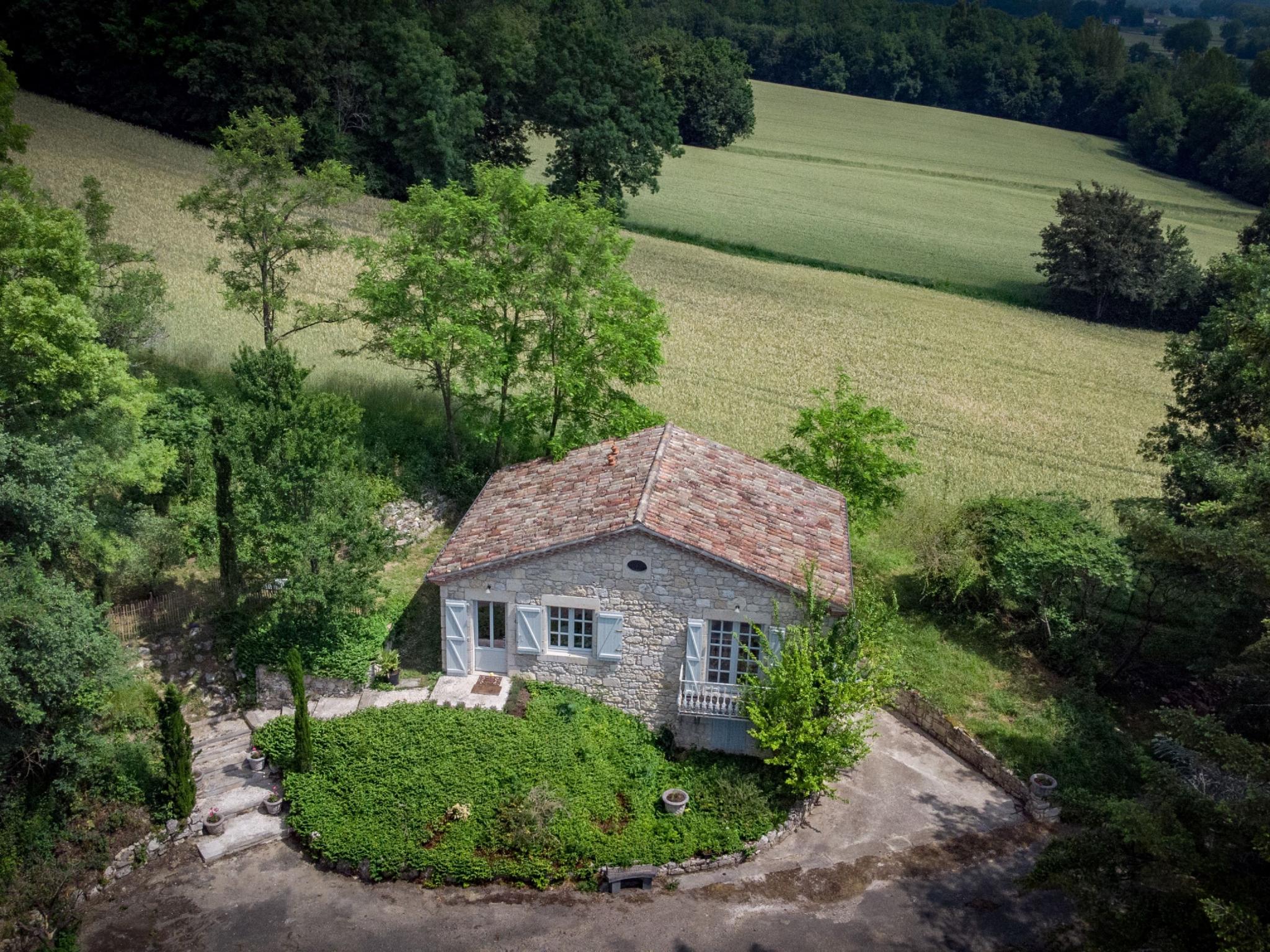 Bedroom with comfortable beds at Gite La Folie in Saint Maurin