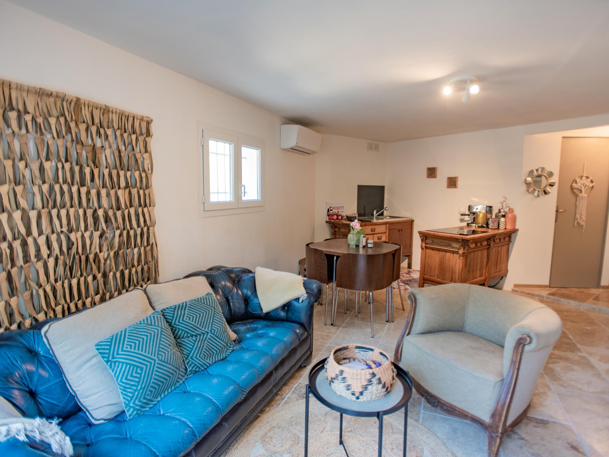 Outdoor terrace and views at La grande Pinède in Faucon