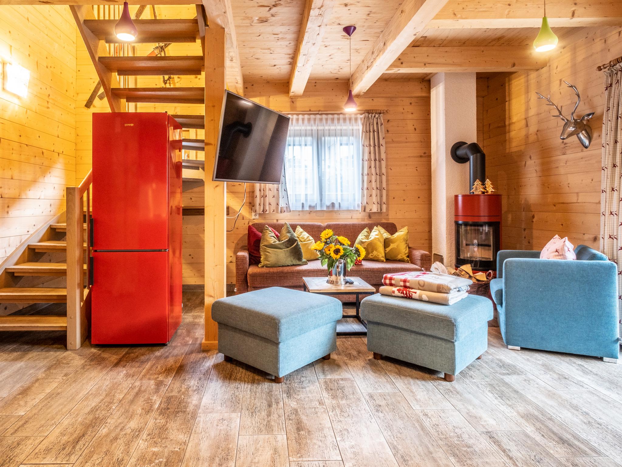 Bedroom with comfortable beds at Luxury Lodge Kaprun Ost A in Kaprun