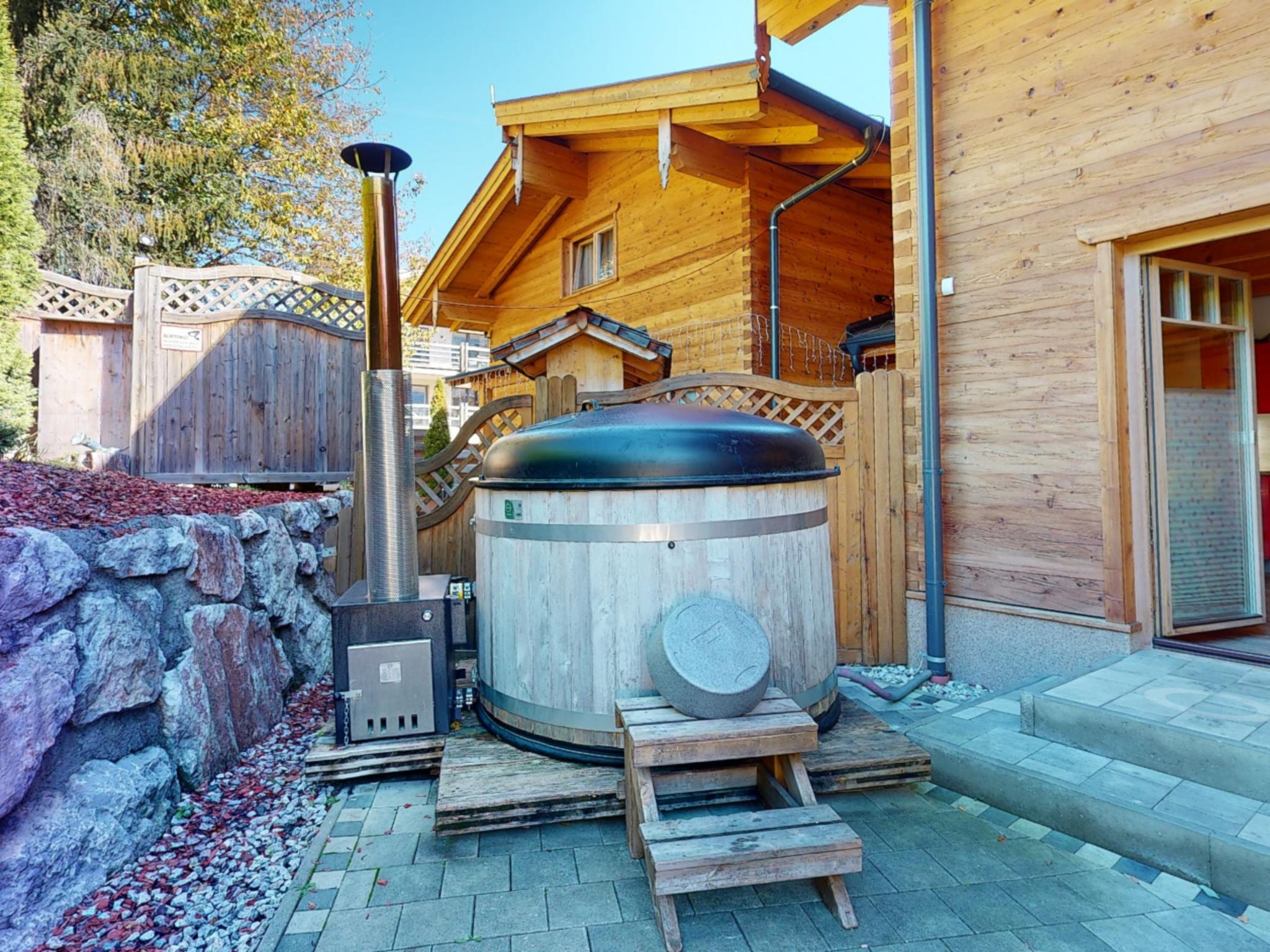 Bedroom with comfortable beds at Luxury Lodge Kaprun Ost B in Kaprun
