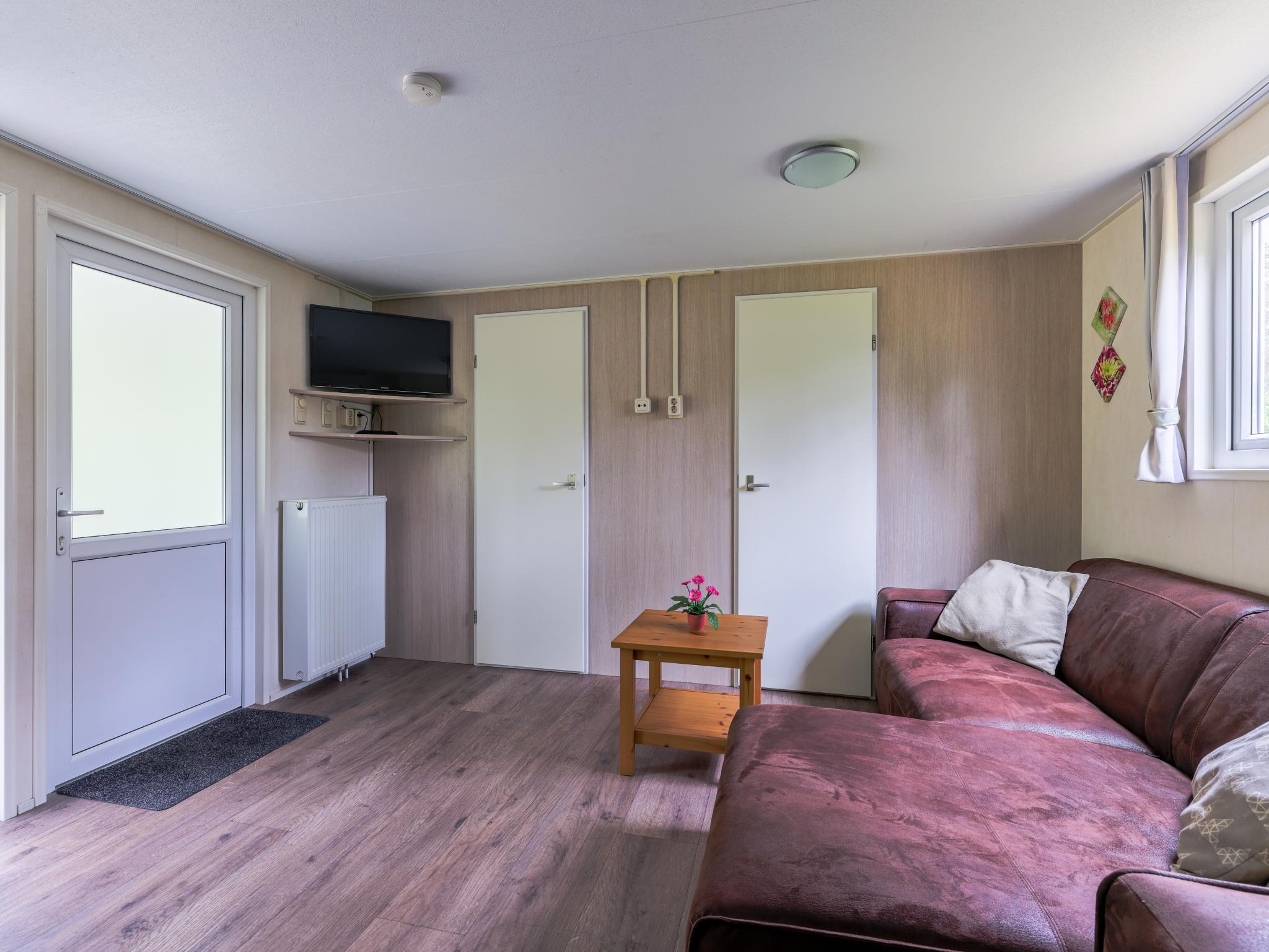 Outdoor terrace and views at Easy Chalet in Vessem