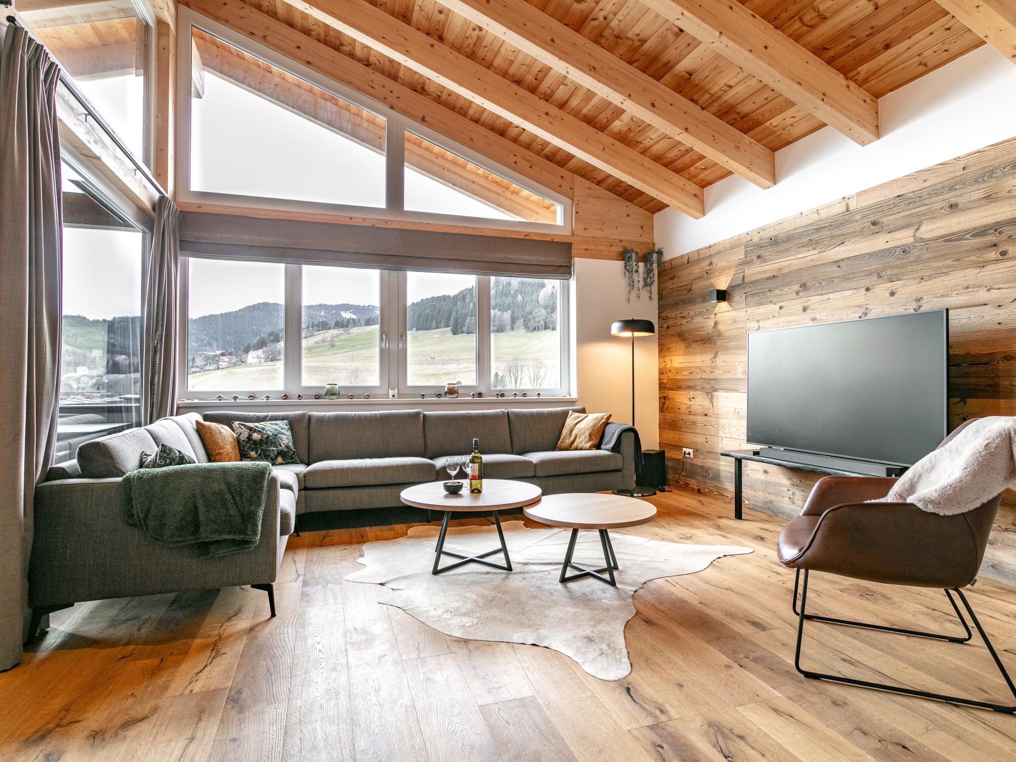 Bedroom with comfortable beds at Grebenzen Lodge 35 in Sankt Lambrecht