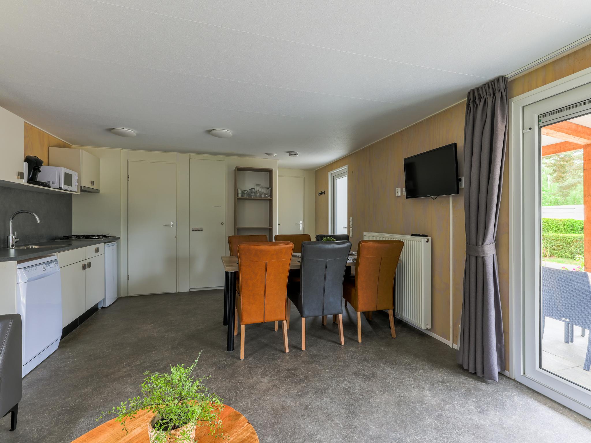 Outdoor terrace and views at Woodlodge XL 588 in Vessem