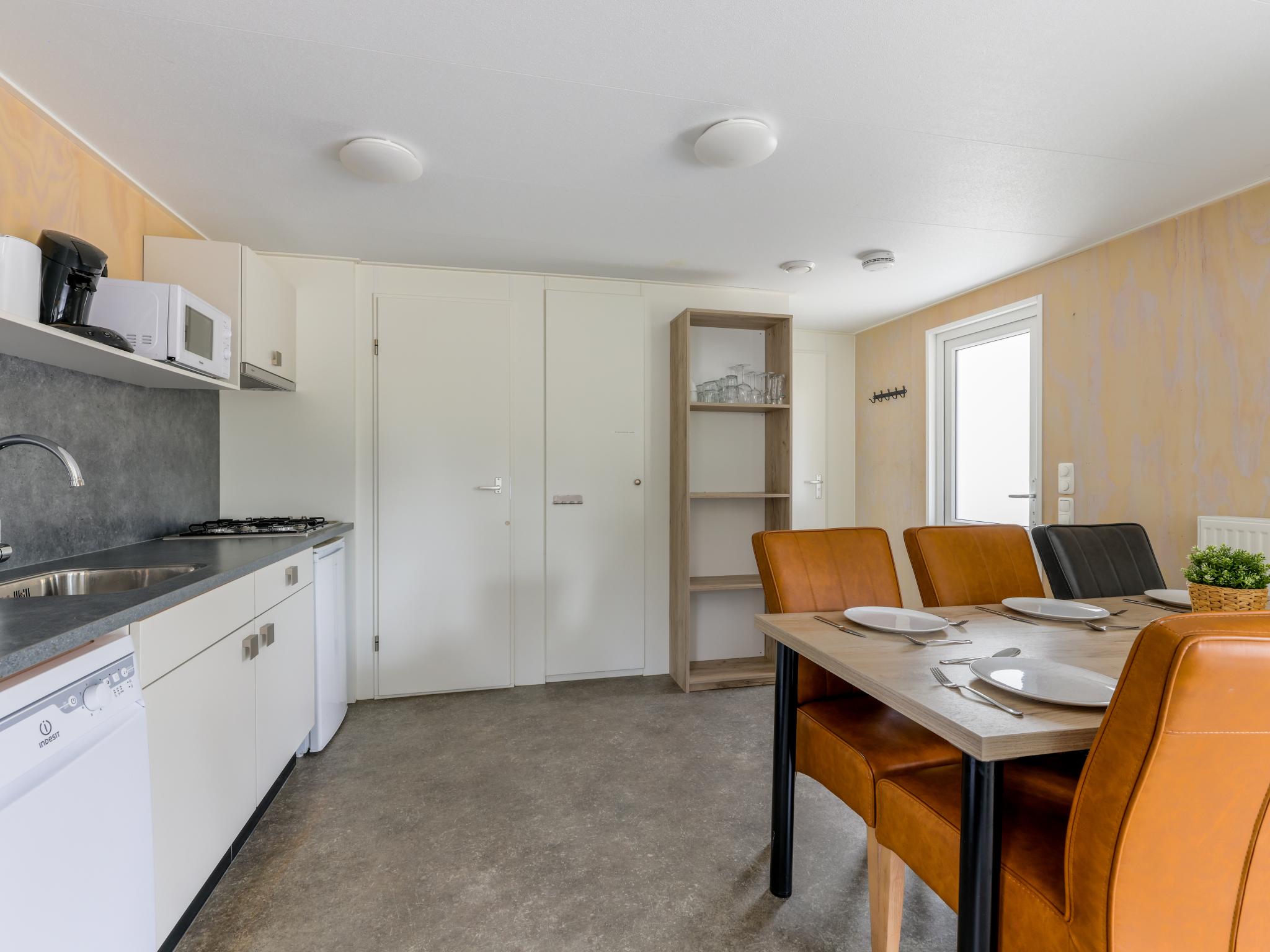 Swimming pool area at Woodlodge XL 588 in Vessem