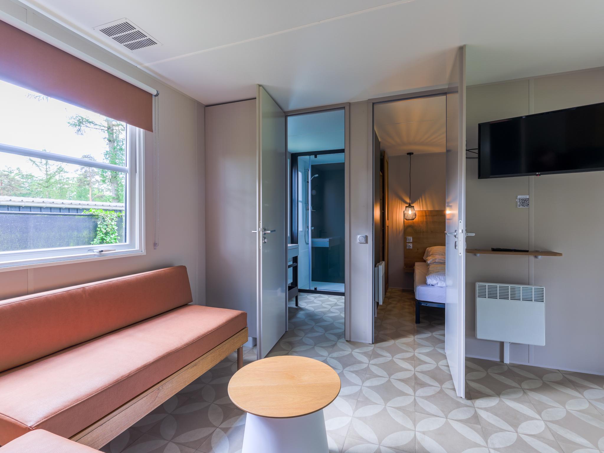 Bedroom with comfortable beds at Boslodge in Vessem