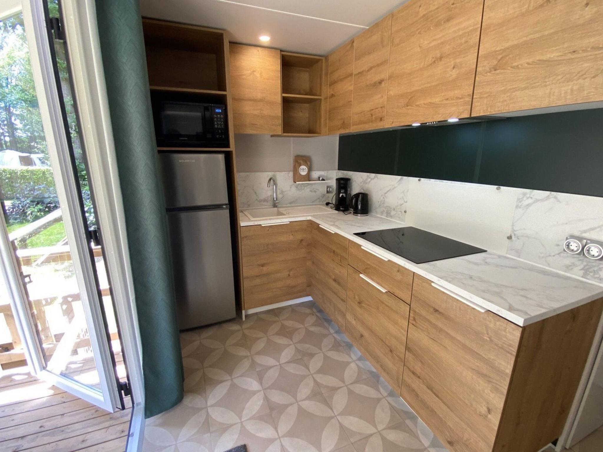 Swimming pool area at Boslodge in Vessem