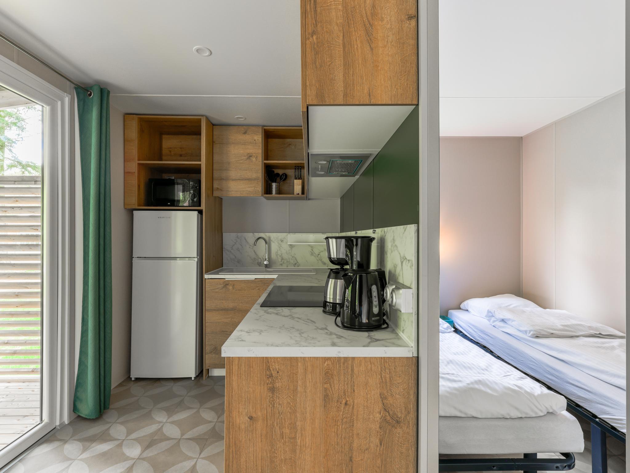 Outdoor terrace and views at Boslodge in Vessem