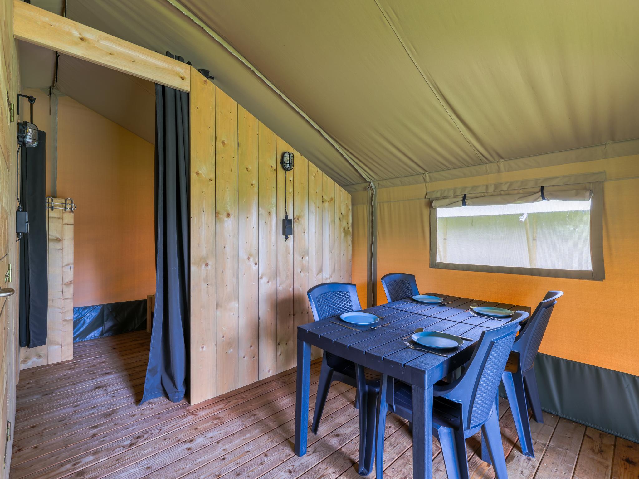 Outdoor terrace and views at Safaritent 4 in Vessem