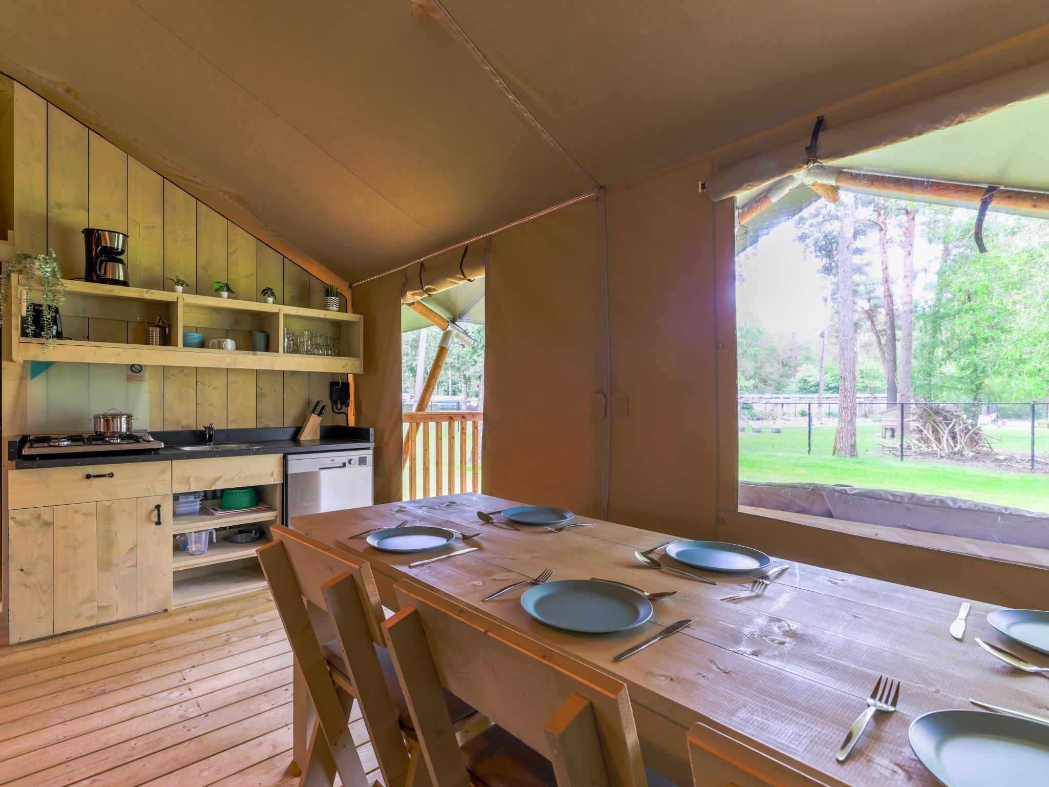 Outdoor terrace and views at Safaritent 7 in Vessem