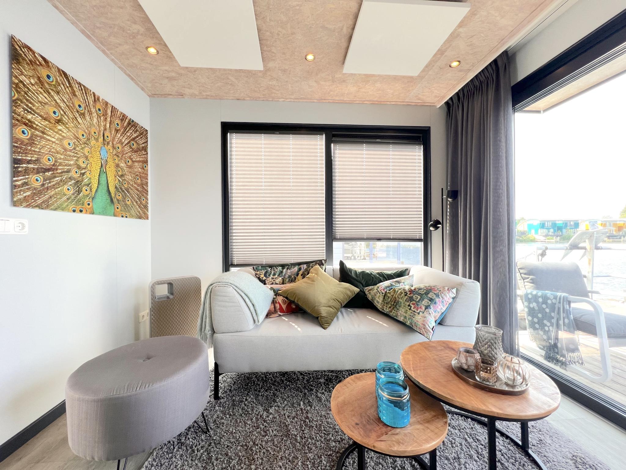 Living area at Jopies Houseboat in Maasbommel