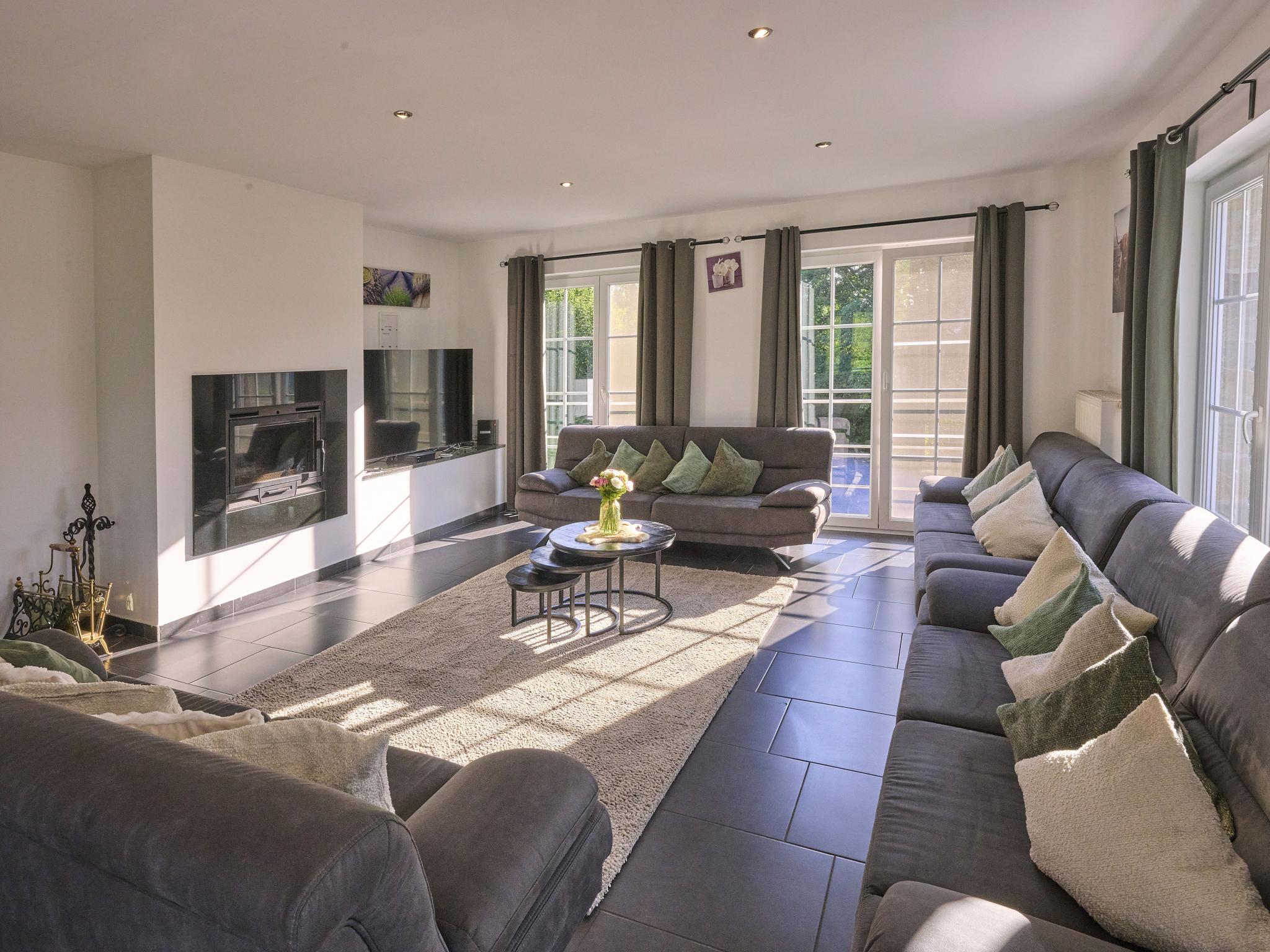 Bedroom with comfortable beds at Sur les Thiers in Lierneux