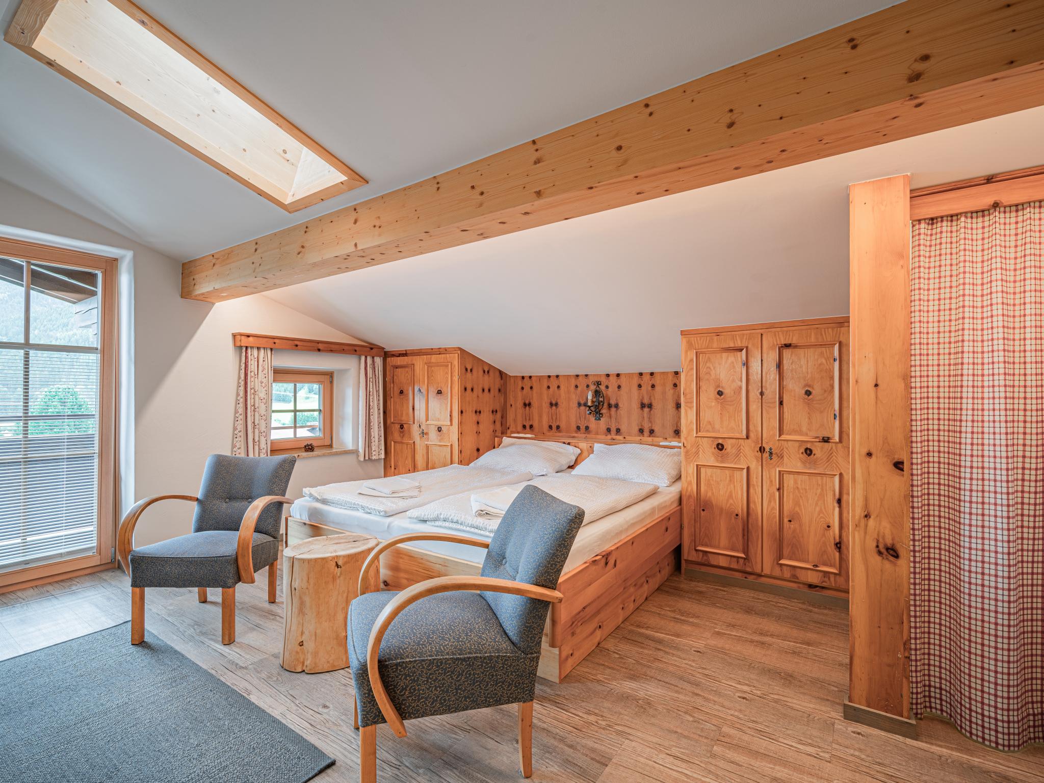 Bedroom with comfortable beds at Röck III in Neukirchen am Großvenediger