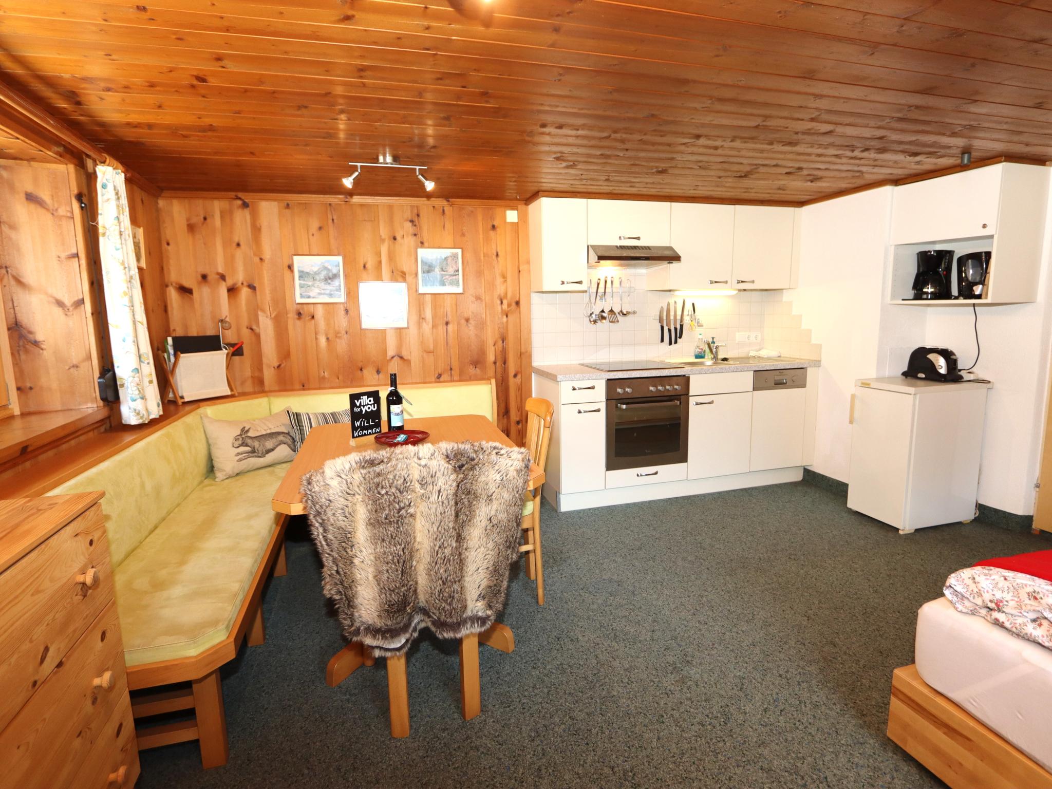 Bedroom with comfortable beds at Tröger II in Bruck am Ziller