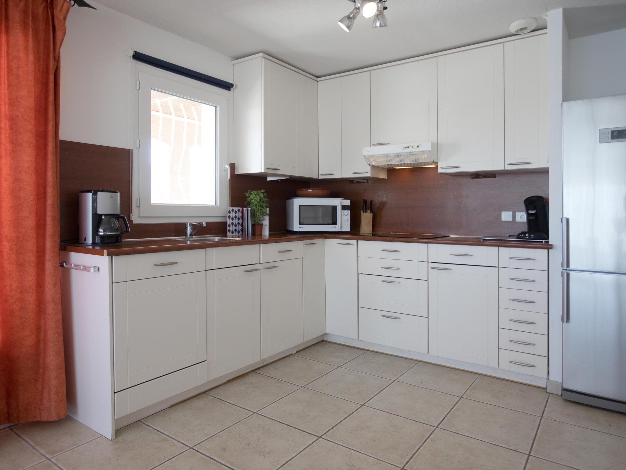 Outdoor terrace and views at Domaine Oliveraie 8 in Aigne