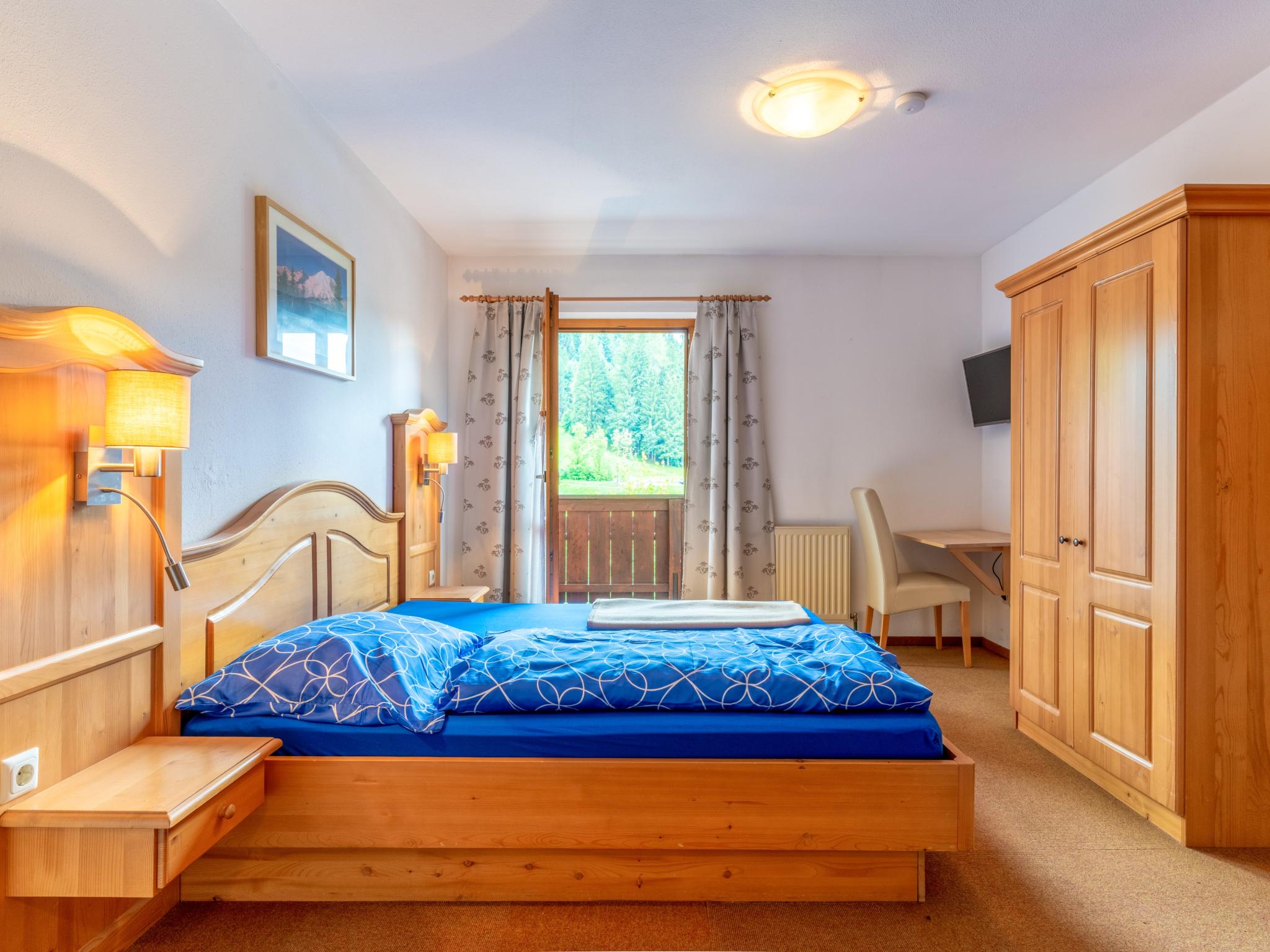 Bedroom with comfortable beds at Pension Blaiken M in Scheffau am Wilden Kaiser