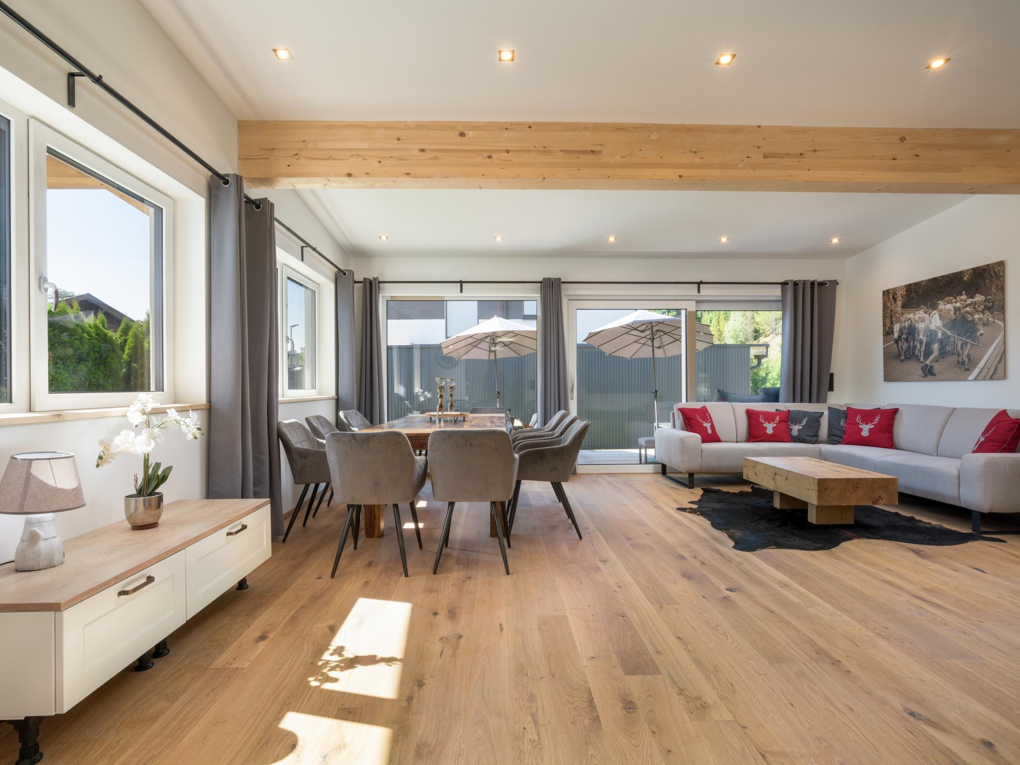 Bedroom with comfortable beds at Chalet Hornblick in Fieberbrunn