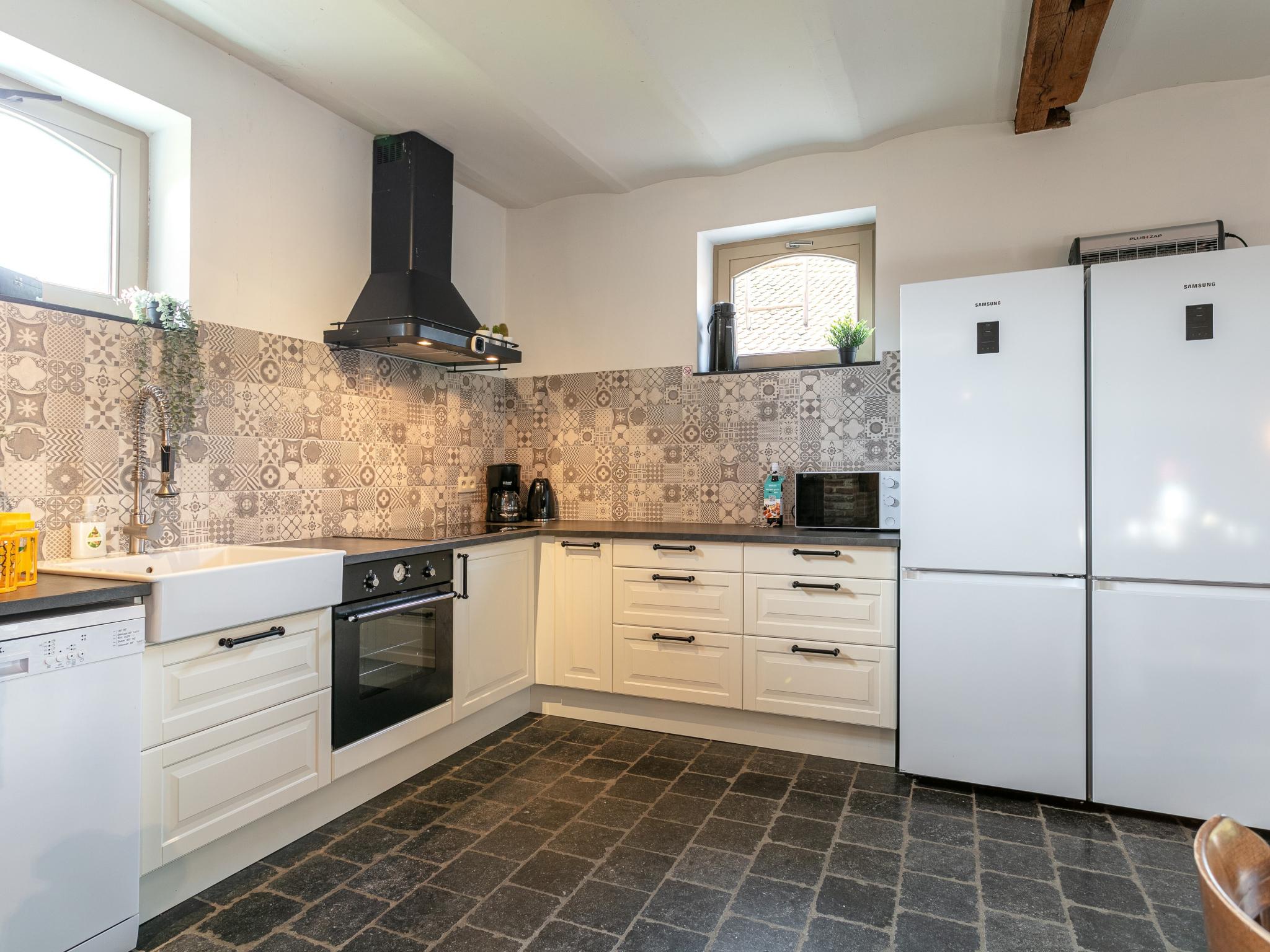 Bedroom with comfortable beds at Alverwege 2 in Merksplas