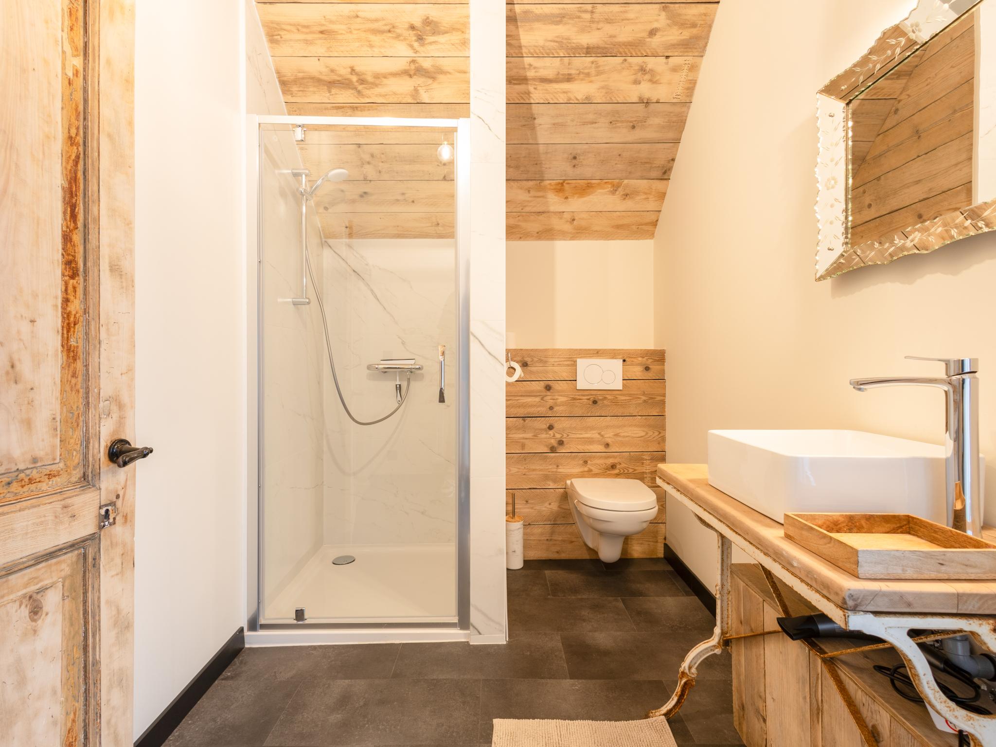 Swimming pool area at Maison Cuberdon in Riemst