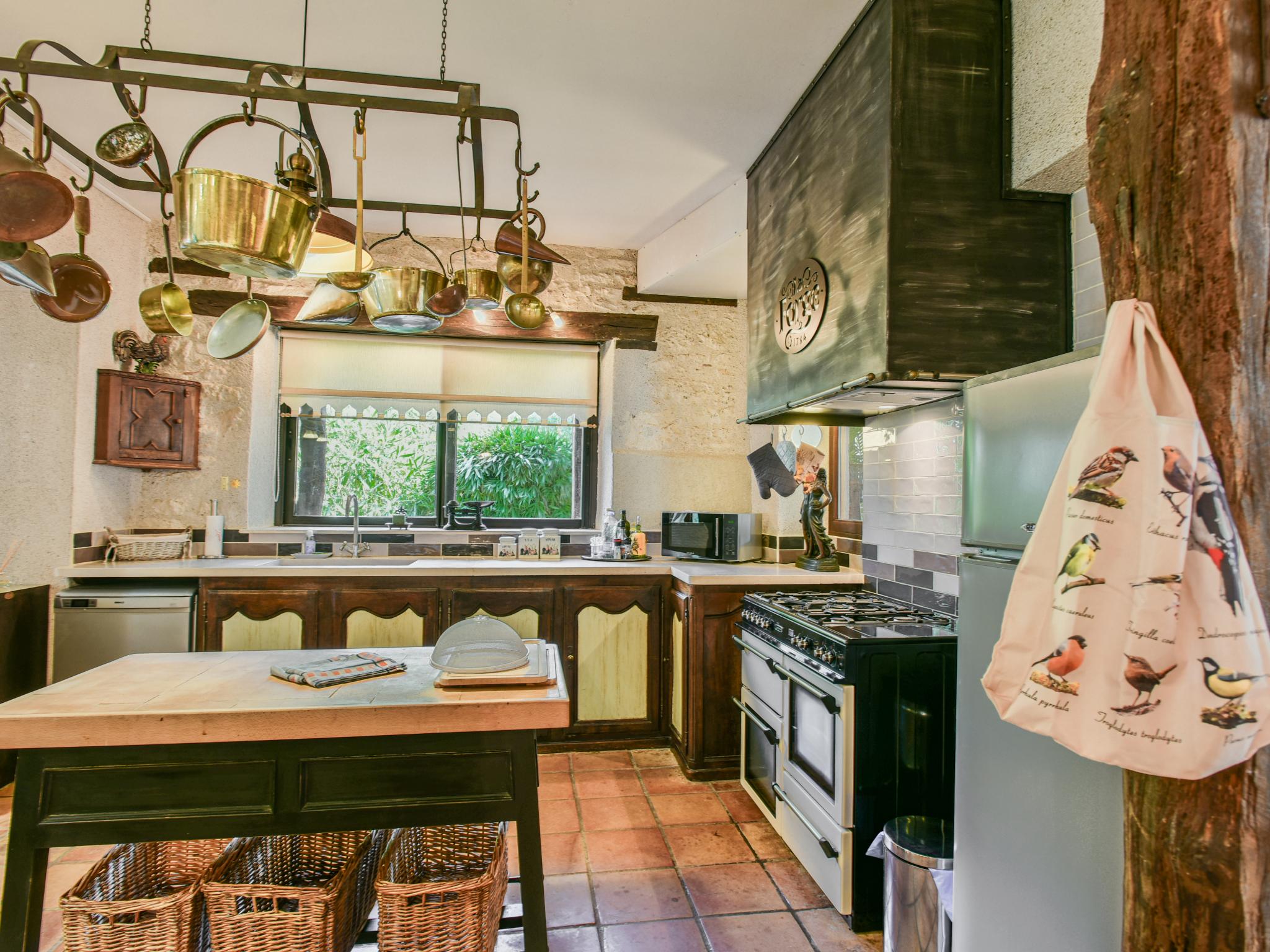 Outdoor terrace and views at Les Roches de Roquecor in roquecor