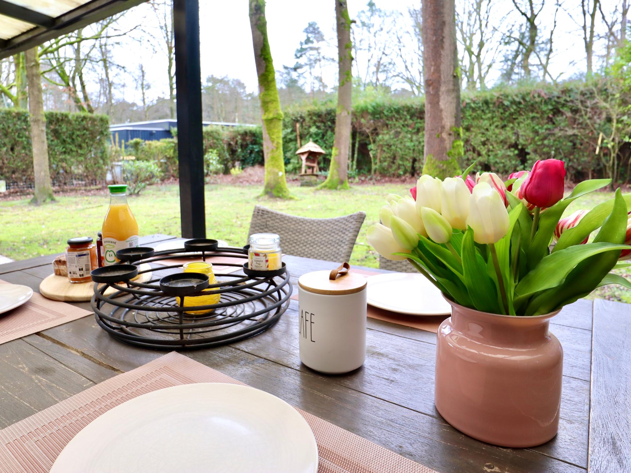 Outdoor terrace and views at Sonnig Bungalow in Lanaken