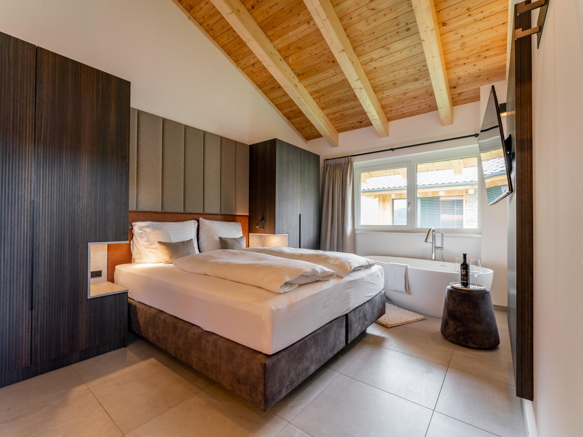 Outdoor terrace and views at Grebenzen Lodge 55 in Sankt Lambrecht