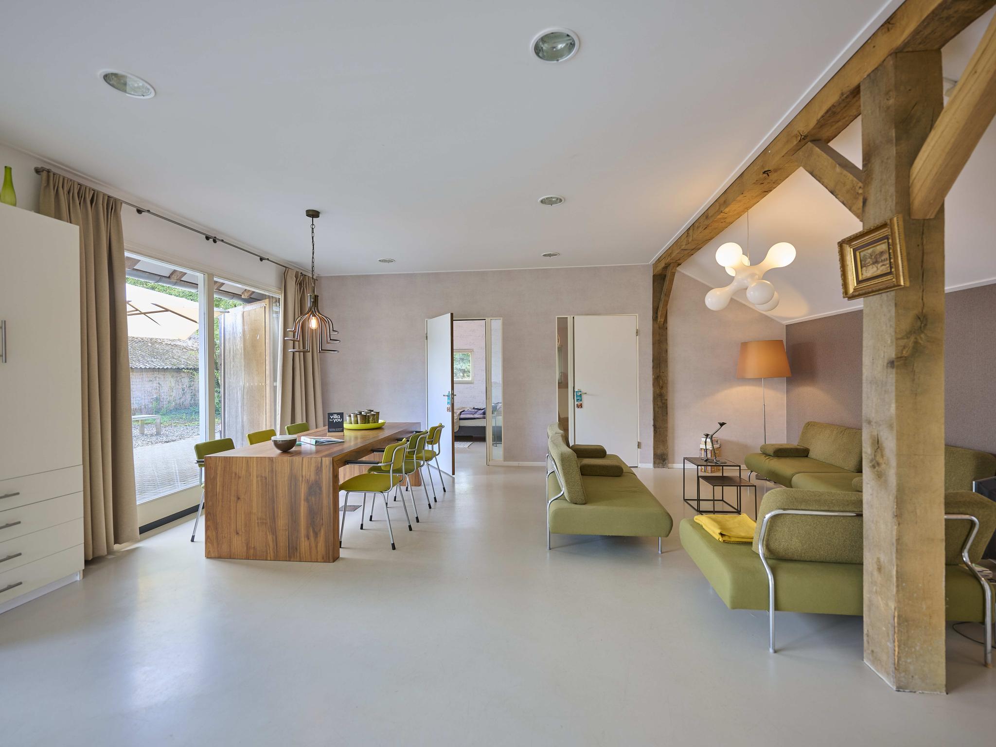 Bedroom with comfortable beds at Design Farmers Barn Twente in Haaksbergen