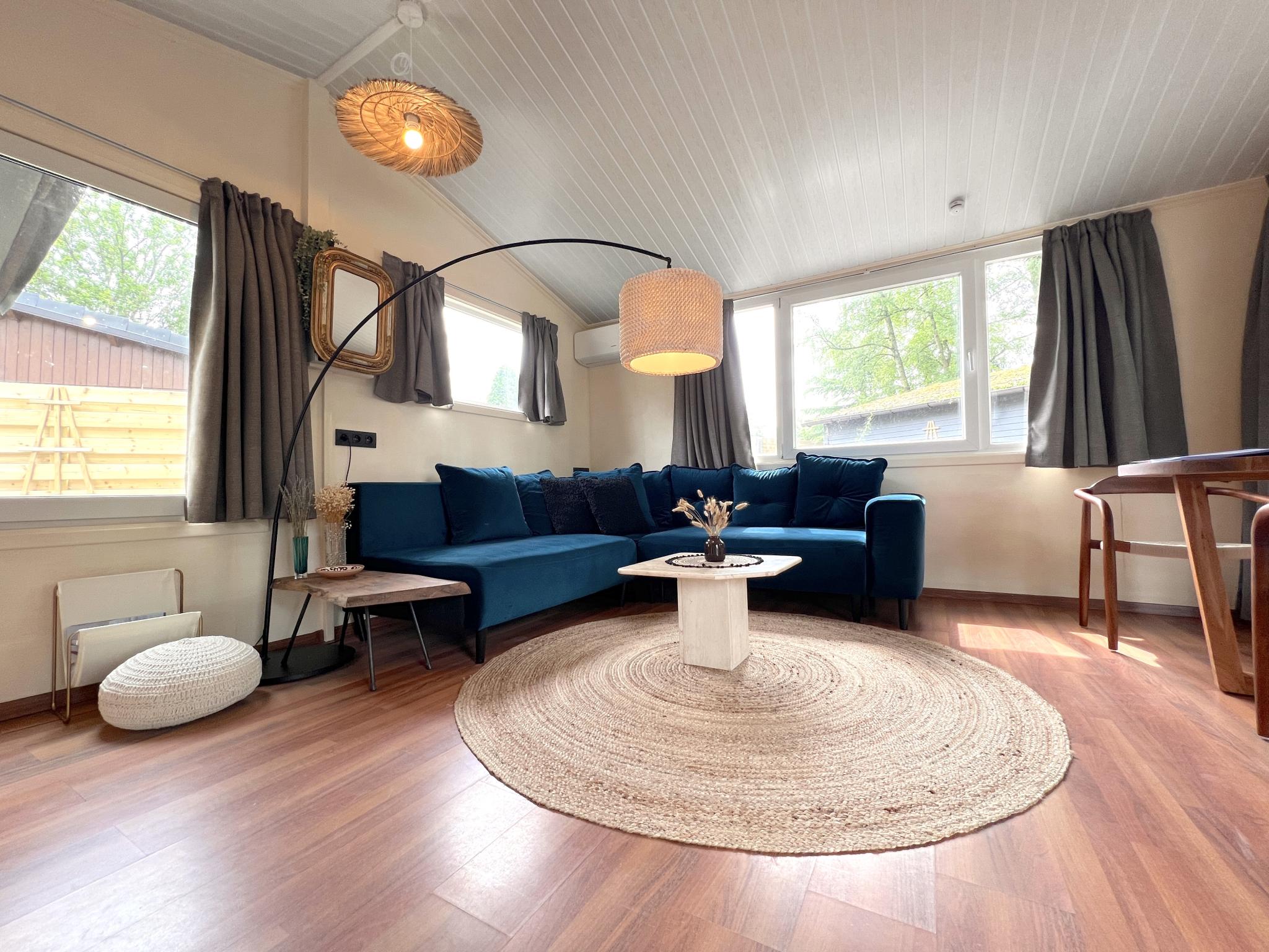 Living area at Charlies Chalet in Geel