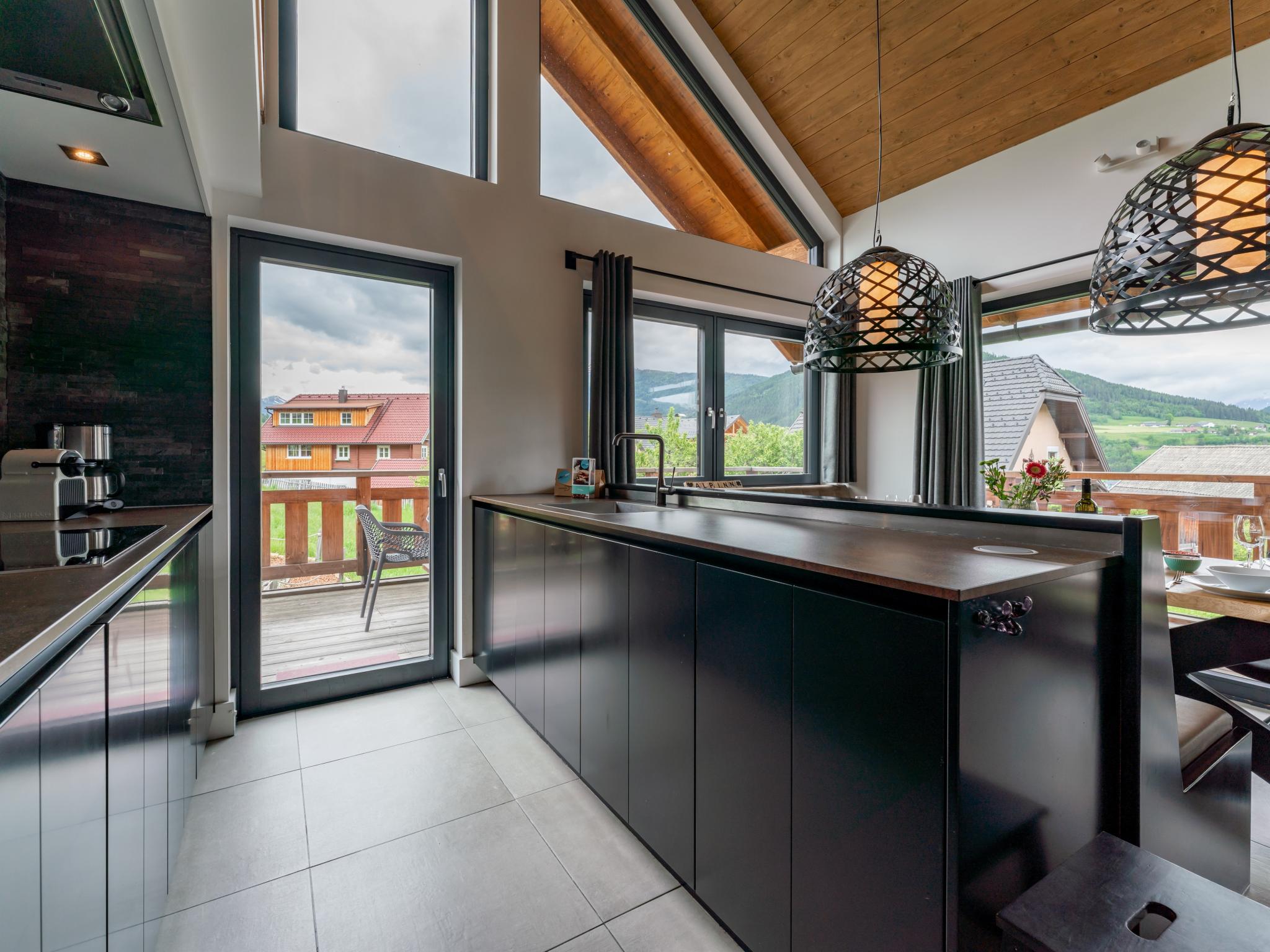 Outdoor terrace and views at Alpinn Wellness 1 in Sankt Margarethen im Lungau