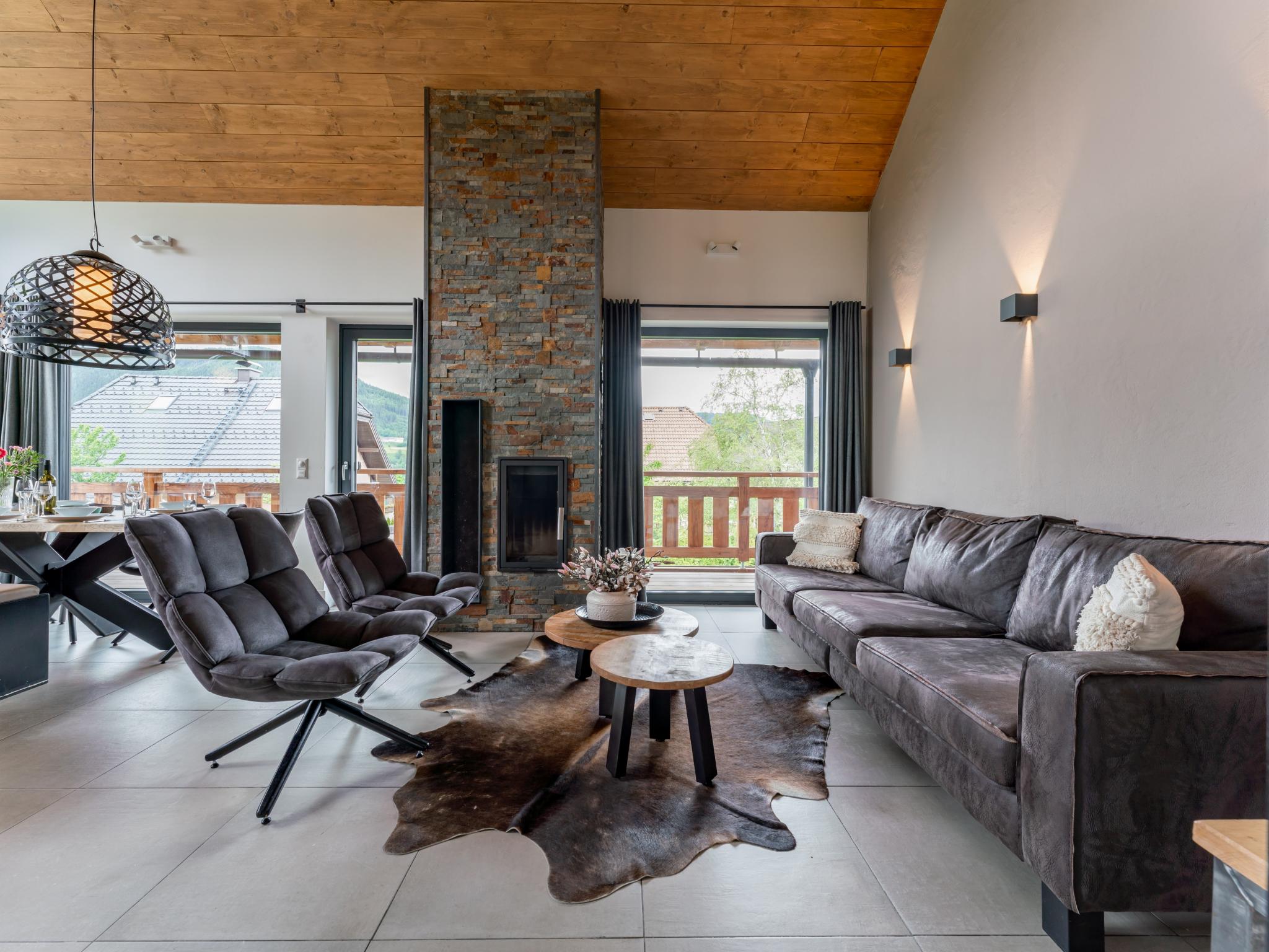 Bedroom with comfortable beds at Alpinn Wellness 1 in Sankt Margarethen im Lungau