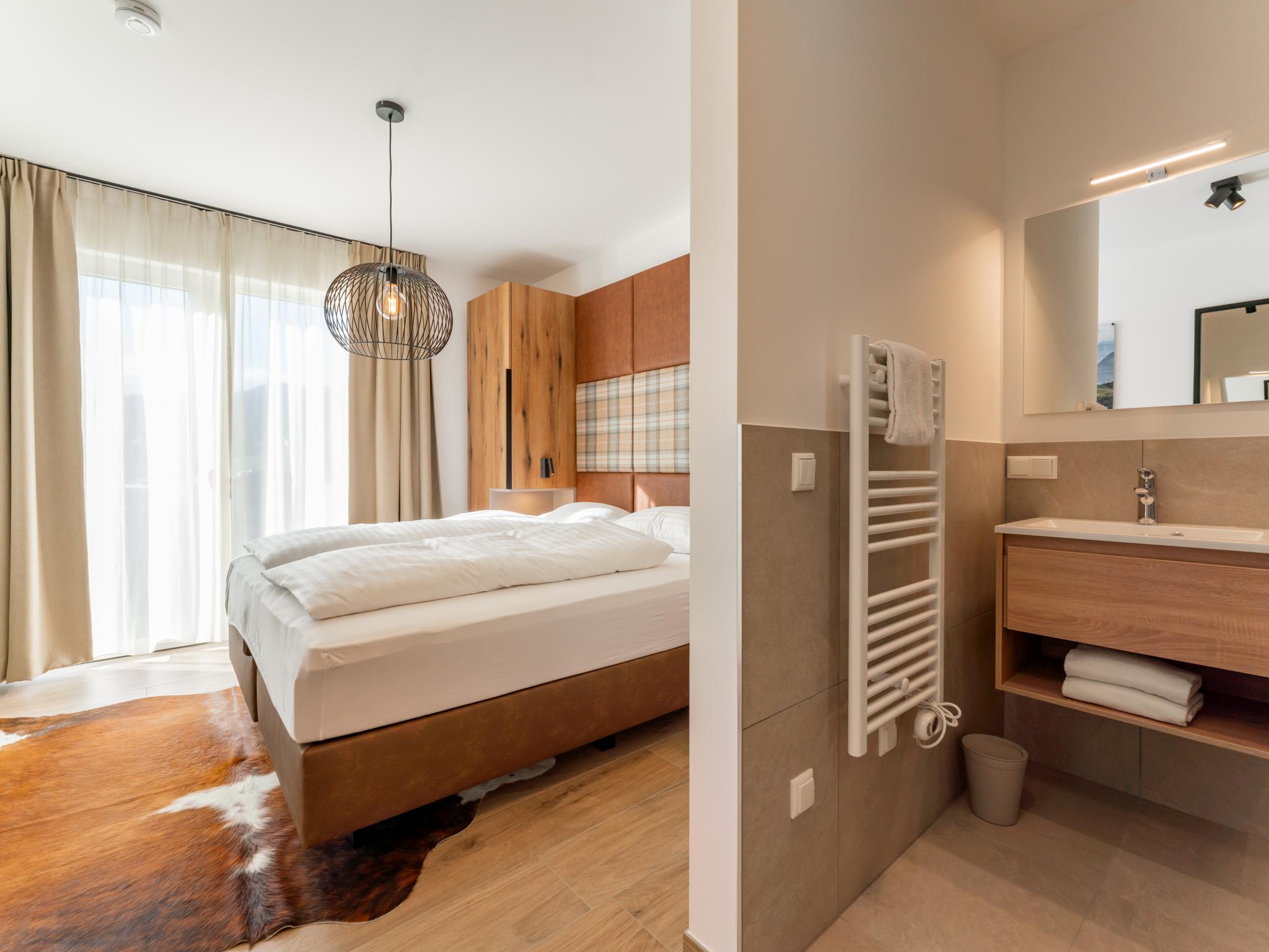 Swimming pool area at Grebenzen Lodge 51A in Sankt Lambrecht