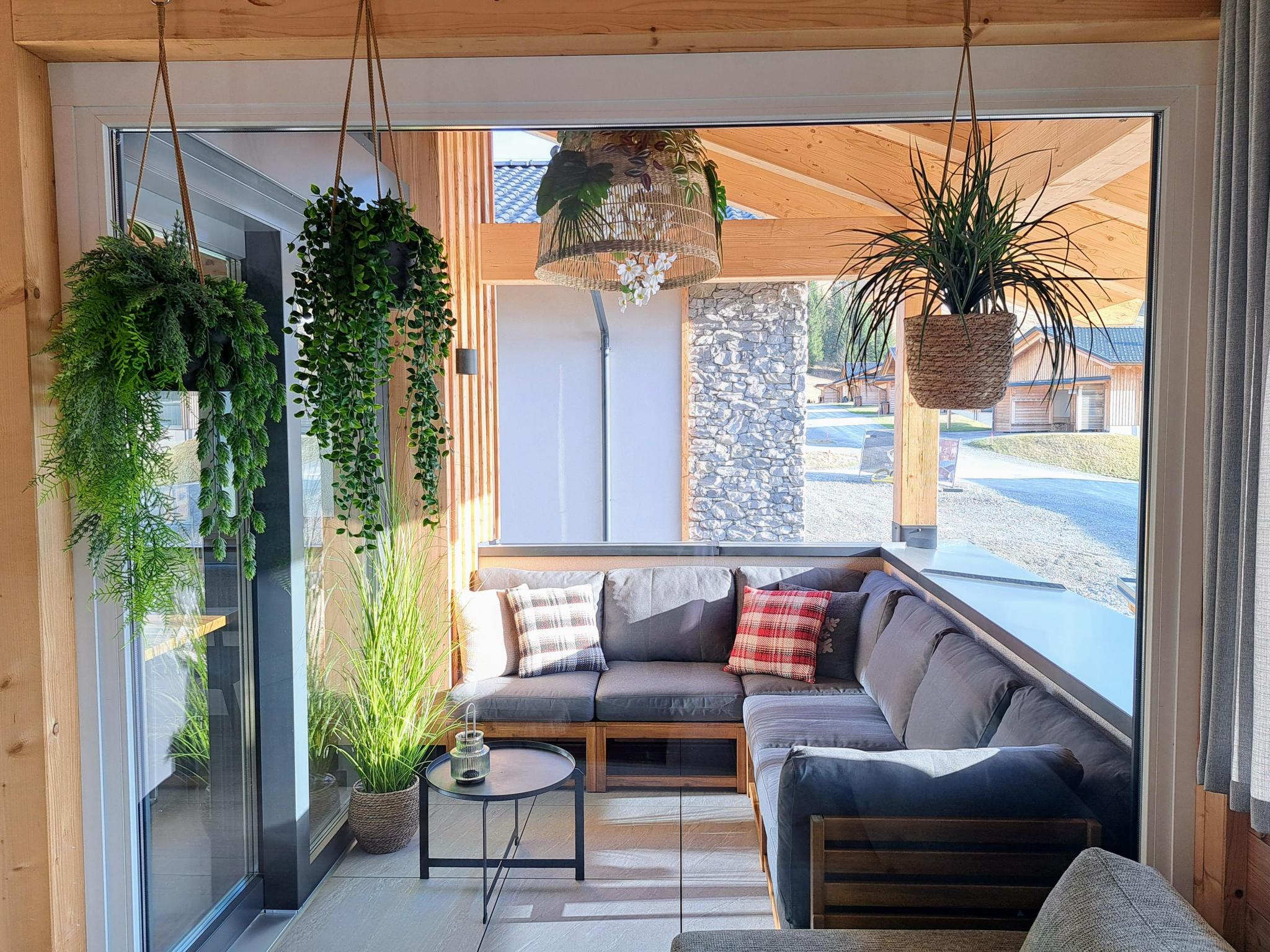 Bedroom with comfortable beds at Grebenzen Lodge Edelweiss in Sankt Lambrecht
