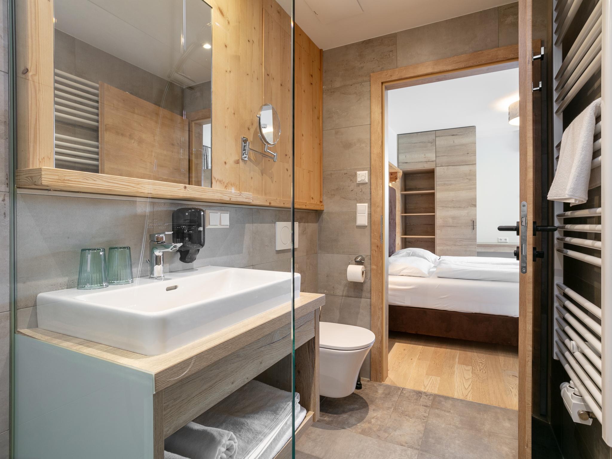 Bedroom with comfortable beds at Apart33 Top 1-26 in Haus im Ennstal