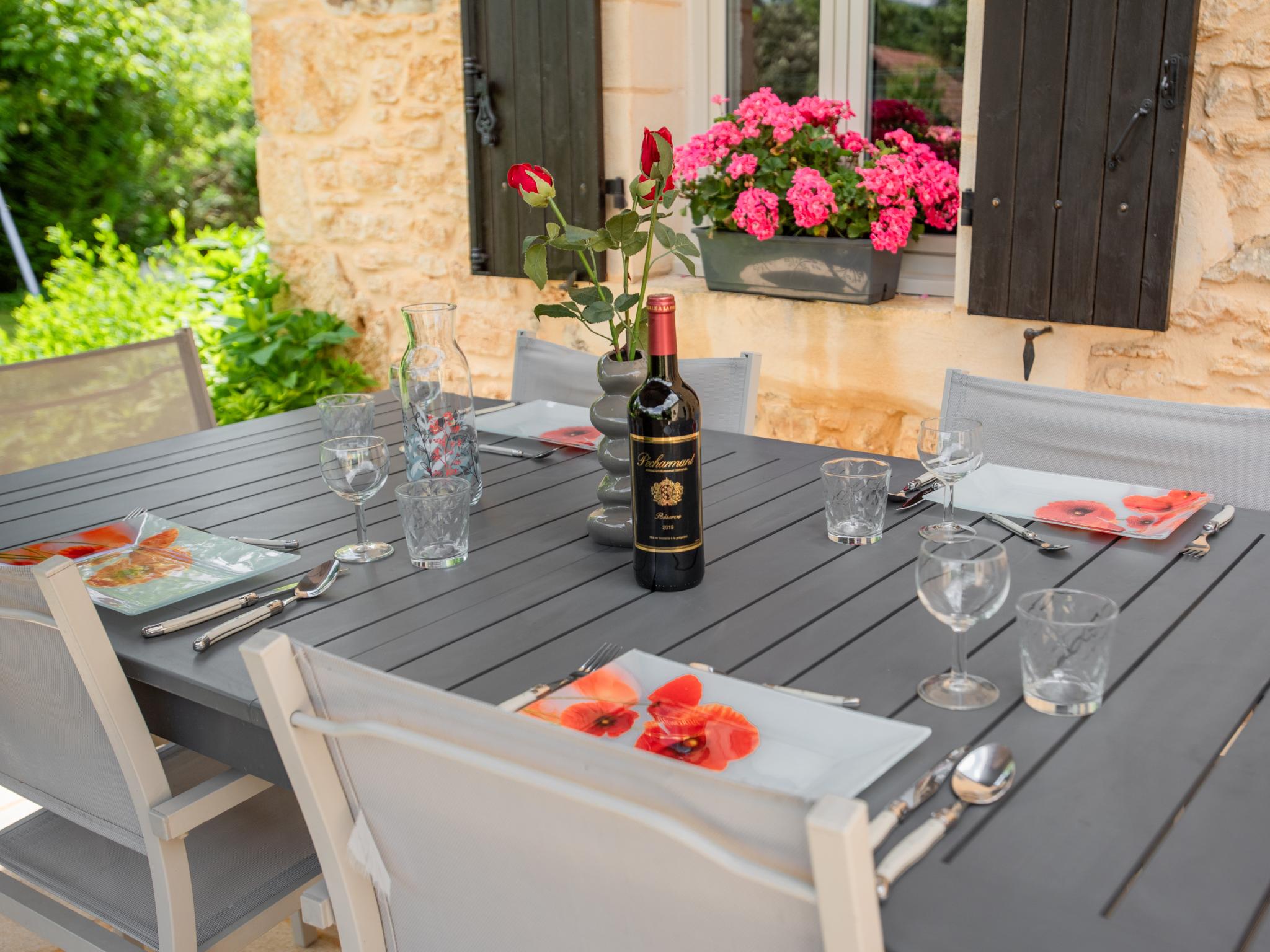 Outdoor terrace and views at L Aiguillou in Besse