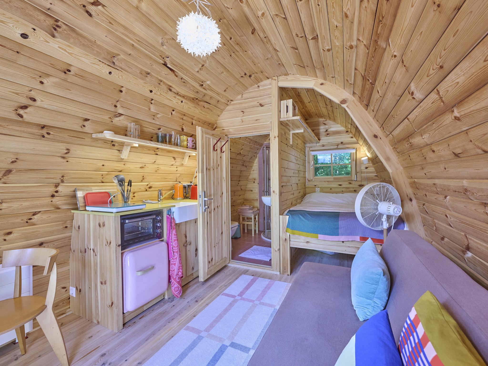 Bedroom with comfortable beds at Tiny House Jet in Goedereede