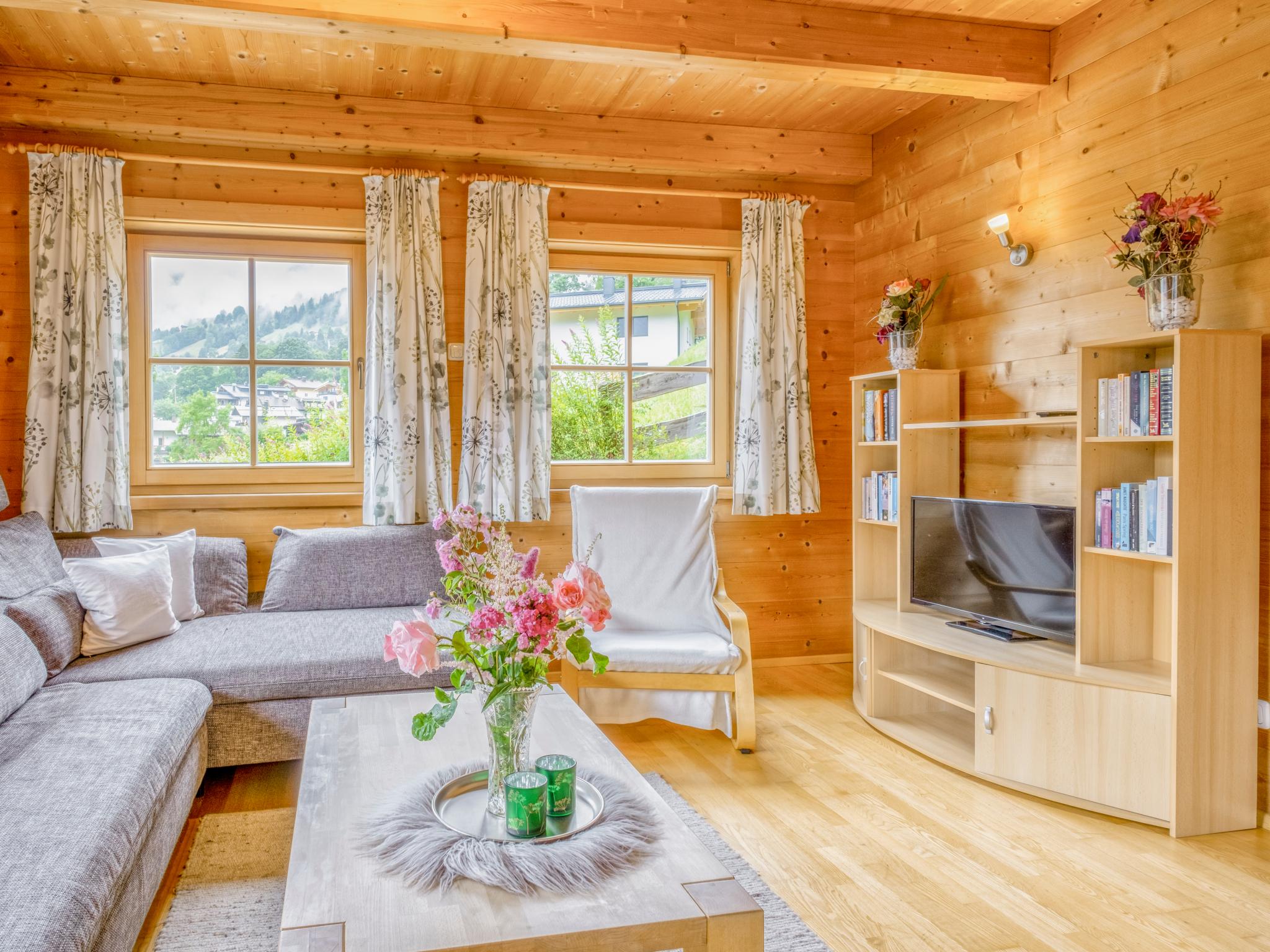 Bedroom with comfortable beds at Mit Dampfbad in Brixen im Thale