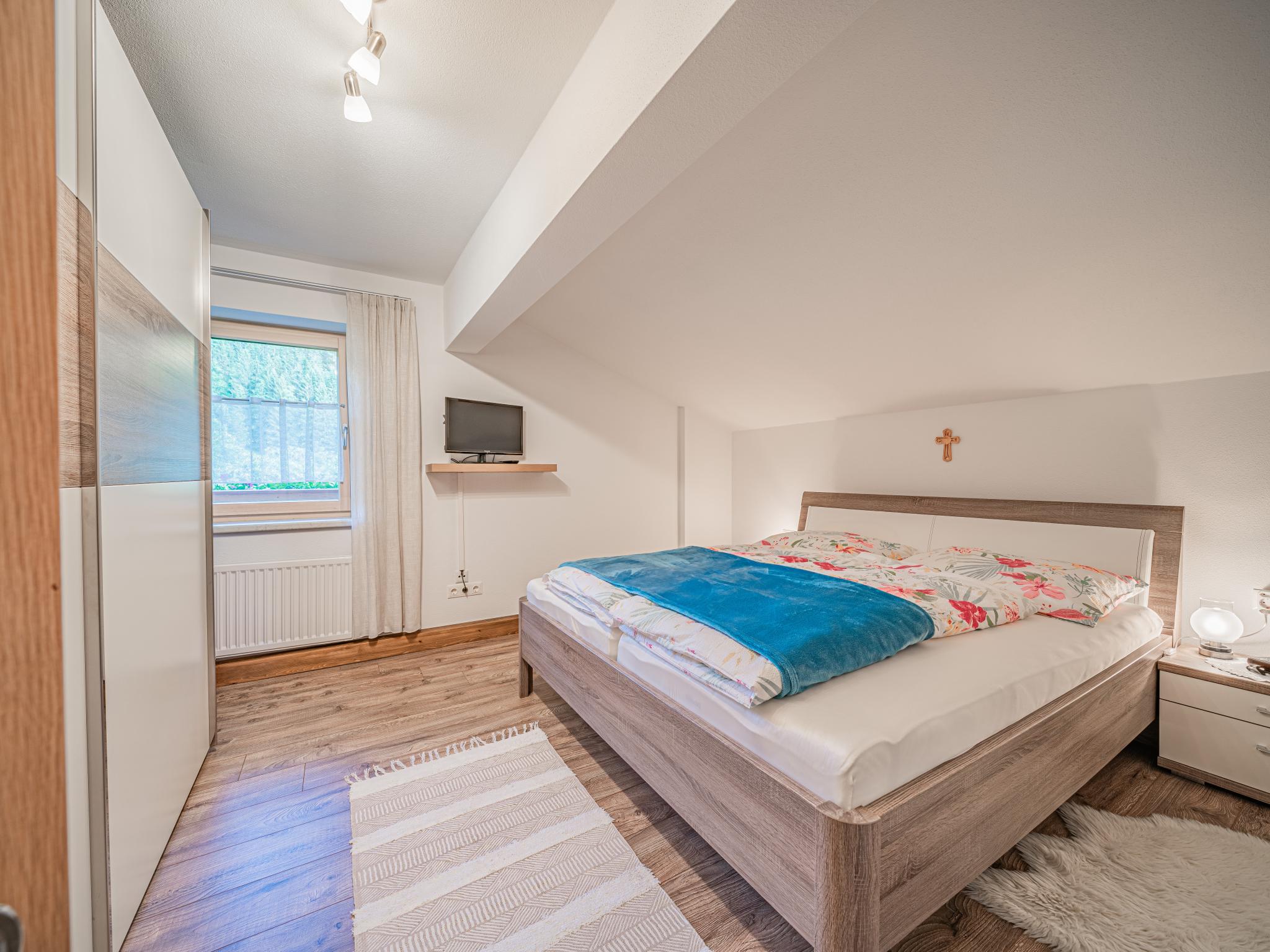 Bedroom with comfortable beds at Gastl in Hopfgarten im Brixental