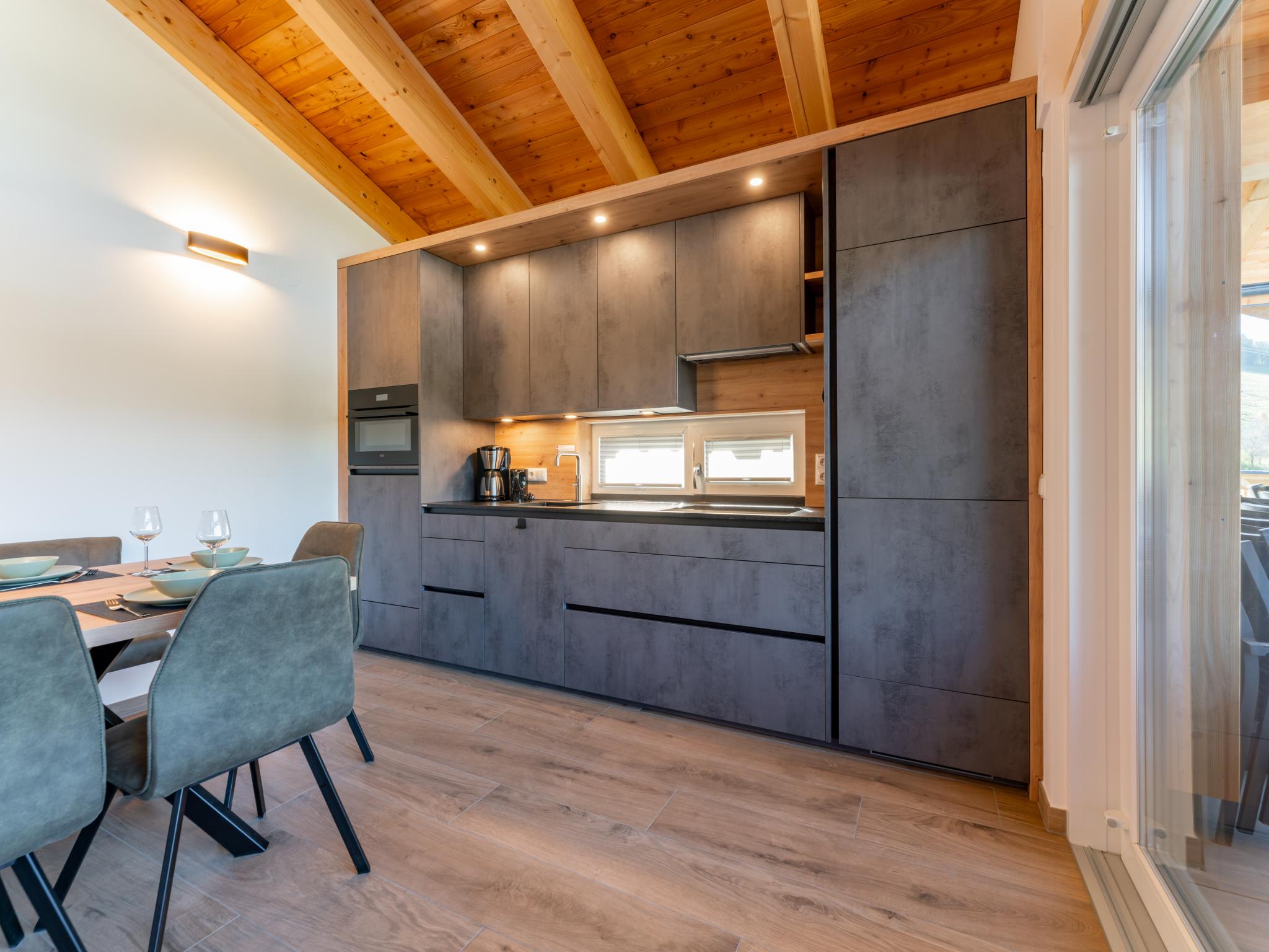 Bedroom with comfortable beds at Grebenzen Lodge 53 in Sankt Lambrecht