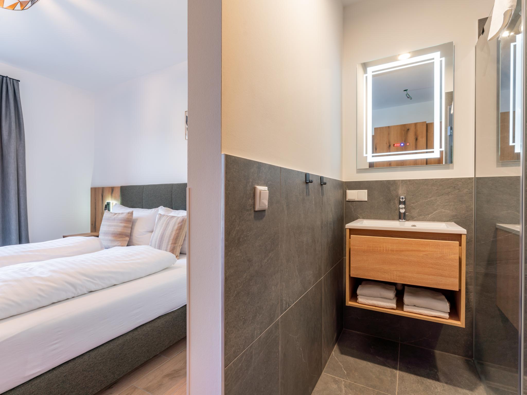 Outdoor terrace and views at Grebenzen Lodge 53 in Sankt Lambrecht