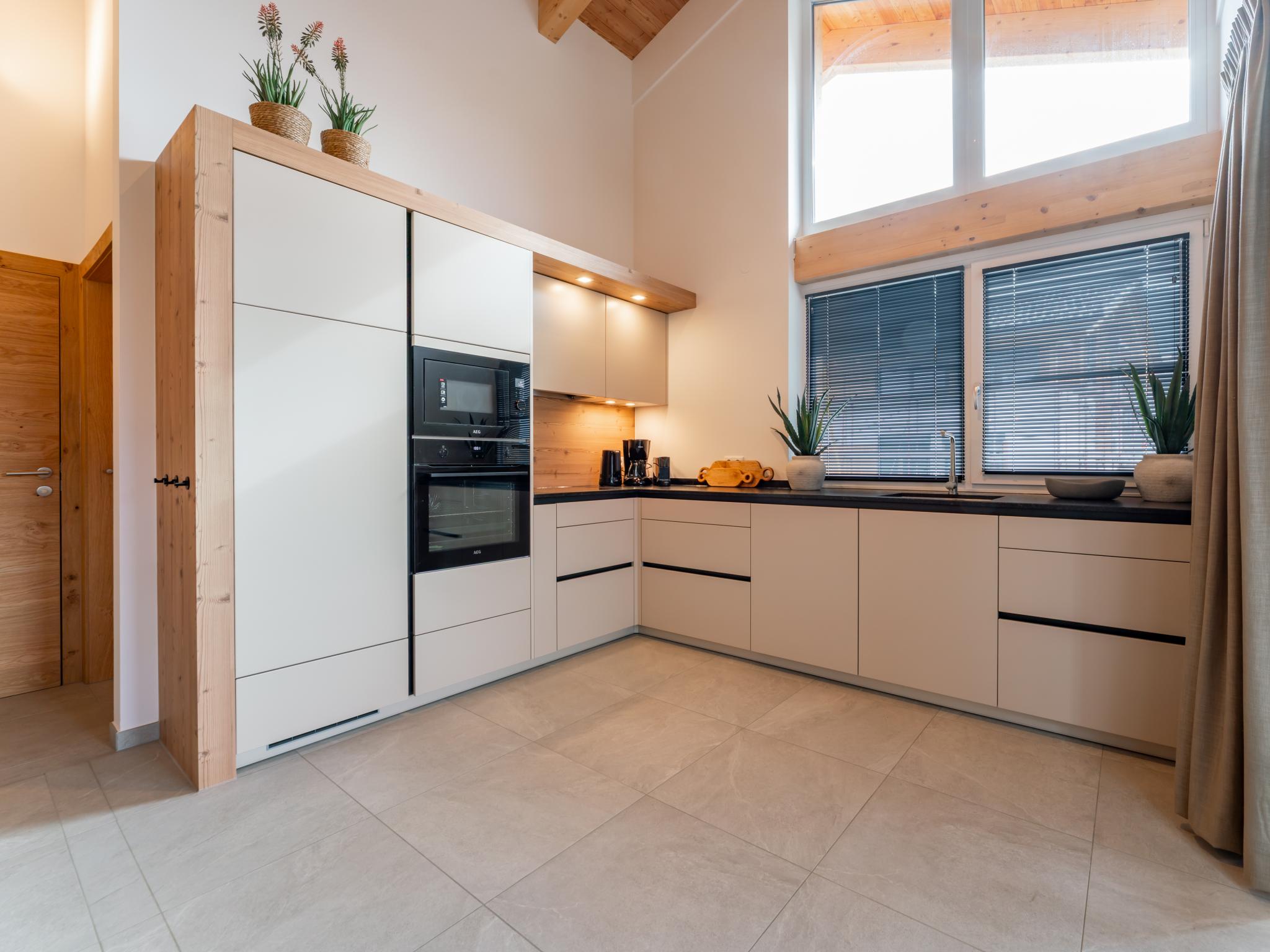 Bedroom with comfortable beds at Grebenzen Lodges 49B in Sankt Lambrecht