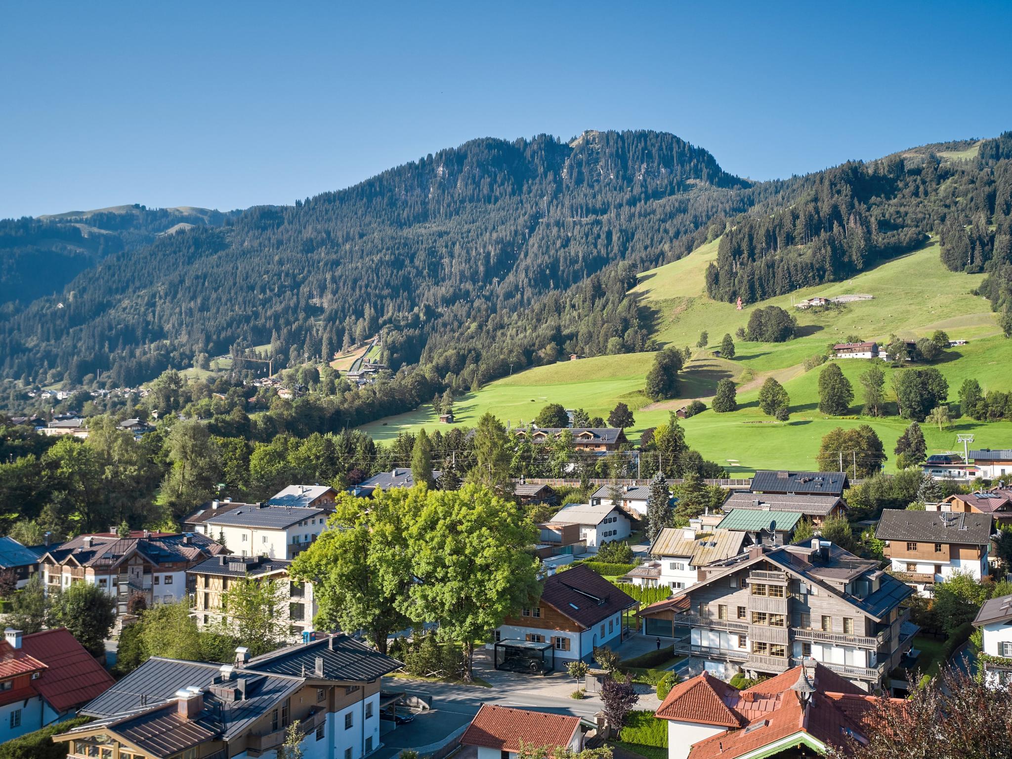 Bedroom with comfortable beds at Stadtchalet Forsthaus in Kitzbühel
