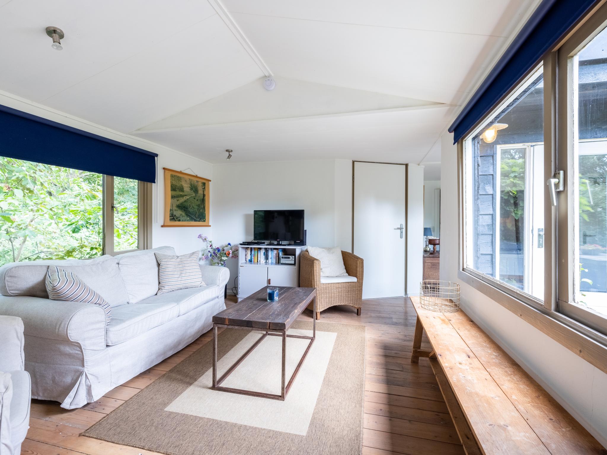 Bedroom with comfortable beds at Vlinder in Bergen