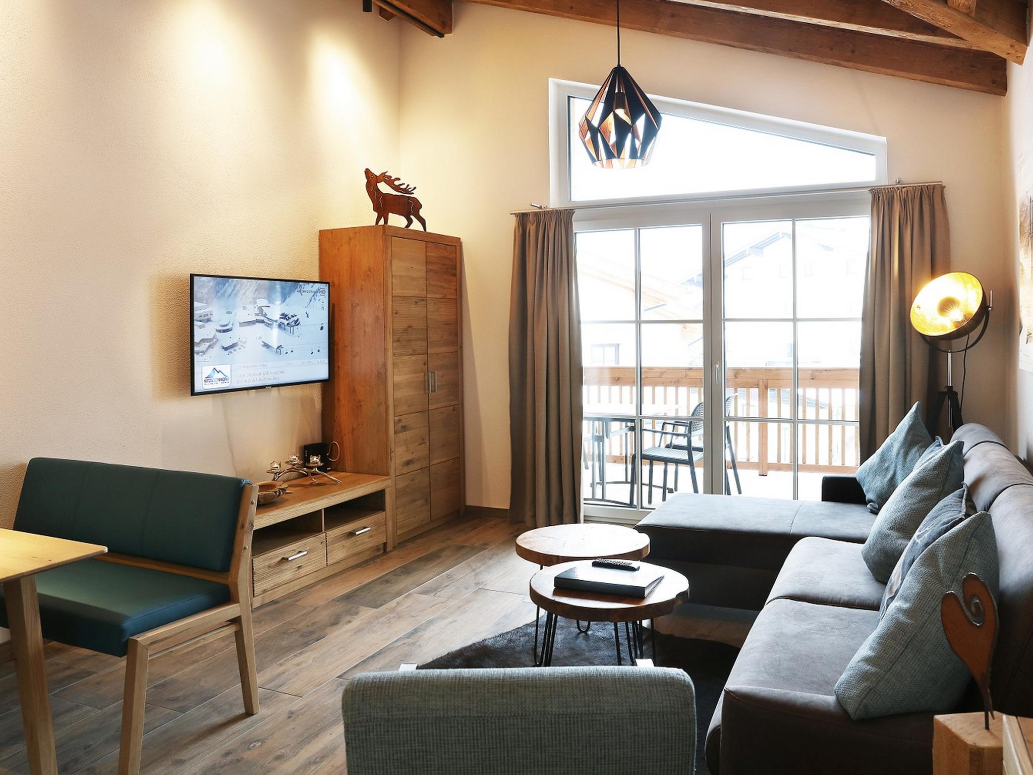 Bedroom with comfortable beds at Tauern Suites Mitterwirt TOP 323 in Piesendorf