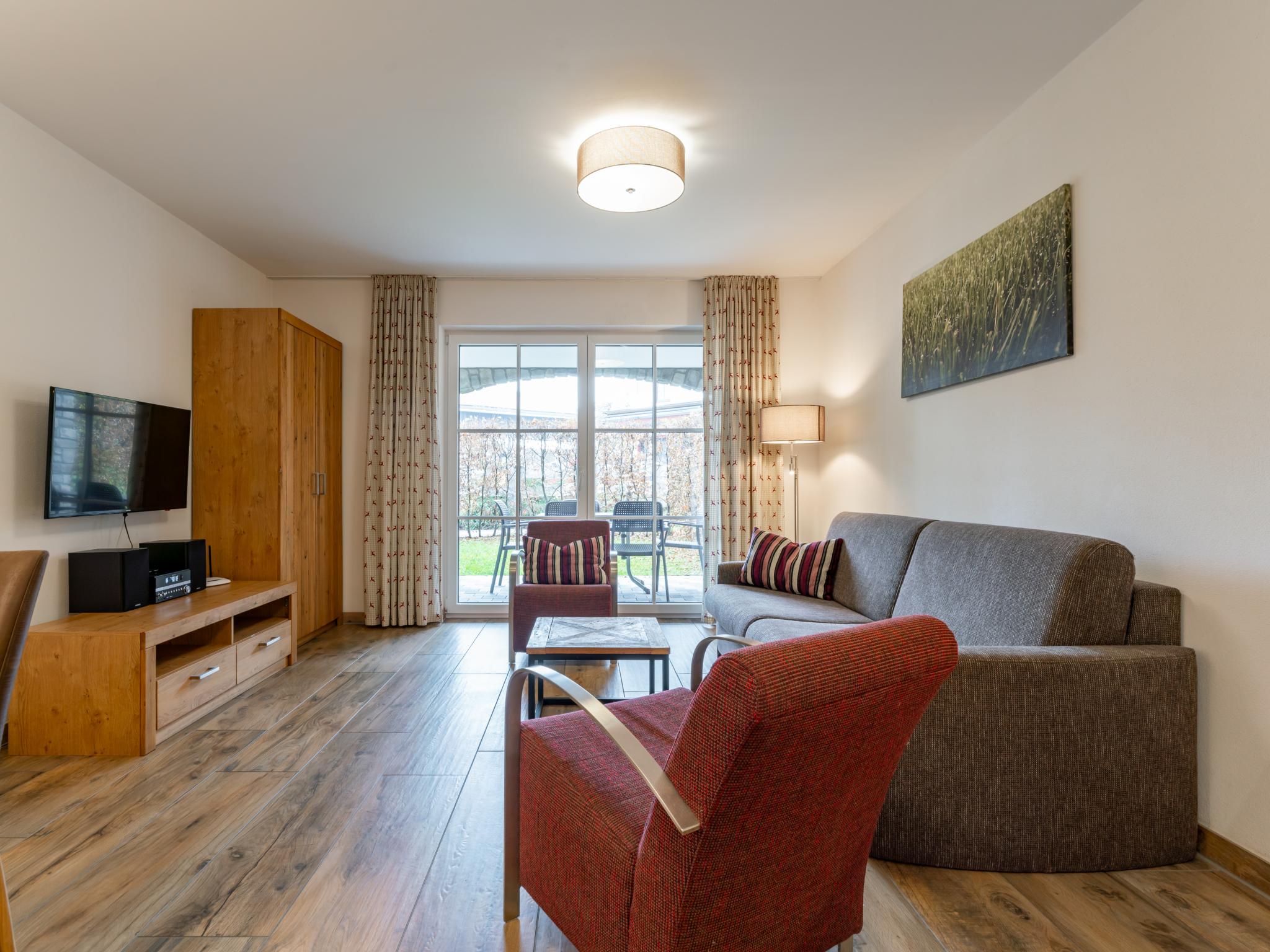 Bedroom with comfortable beds at Tauern Suites Mitterwirt TOP 203 in Piesendorf
