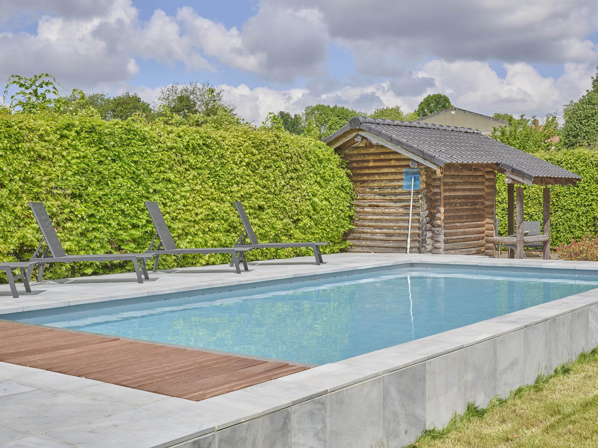 Swimming pool area at Bigaro 1 in Heers