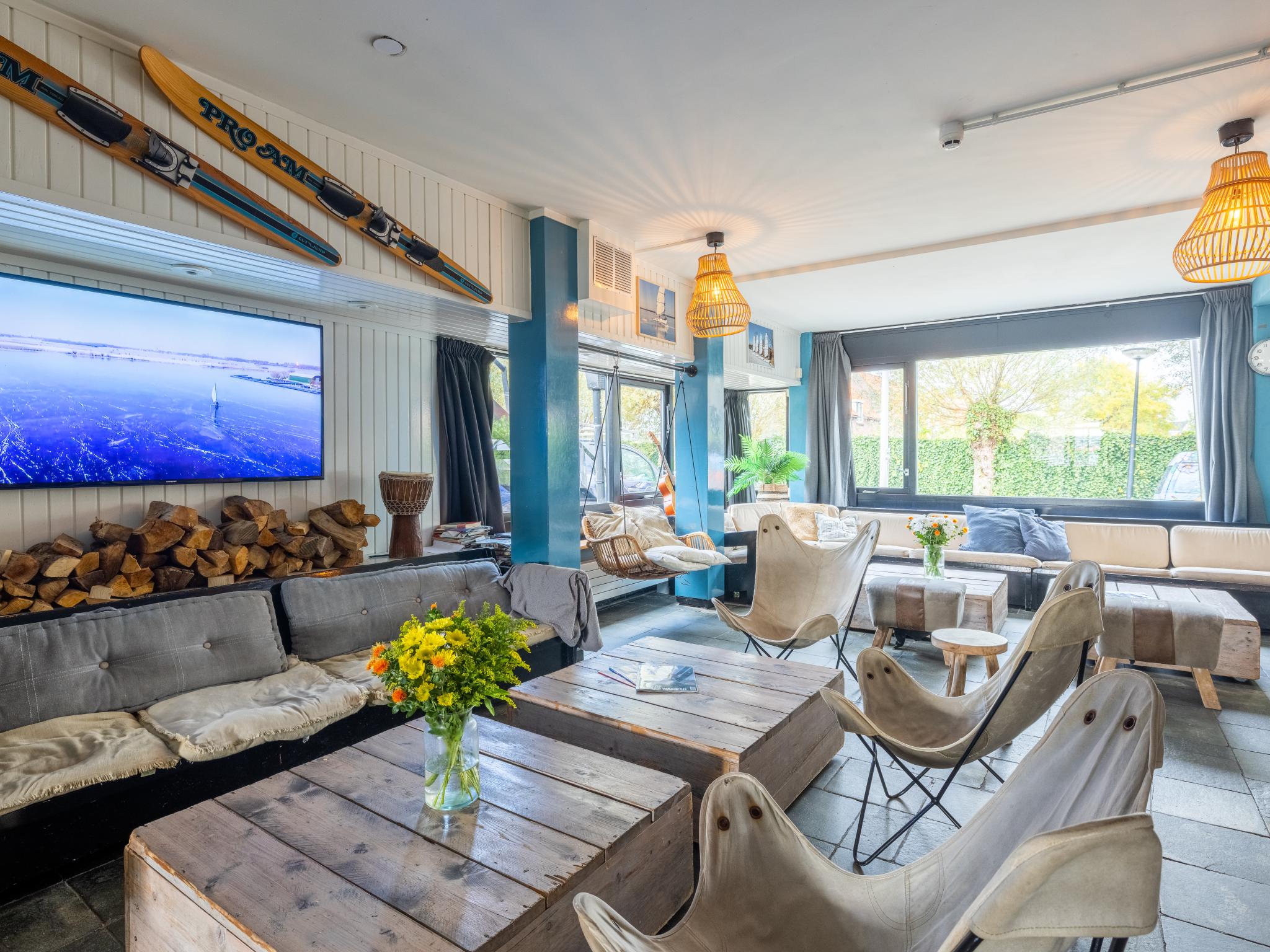 Swimming pool area at De Kaag Watersport Groepsaccommodatie - 80 pers in Kaag