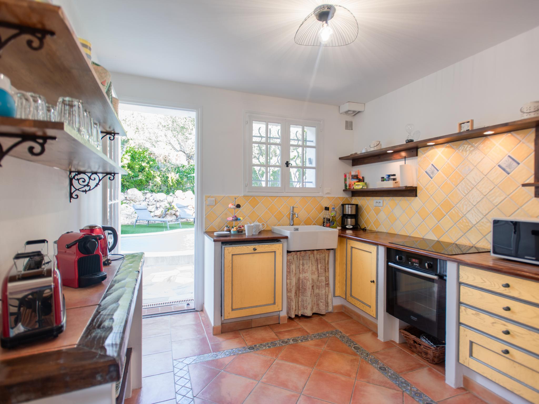 Outdoor terrace and views at Le Rayol in Bagnols en Forêt