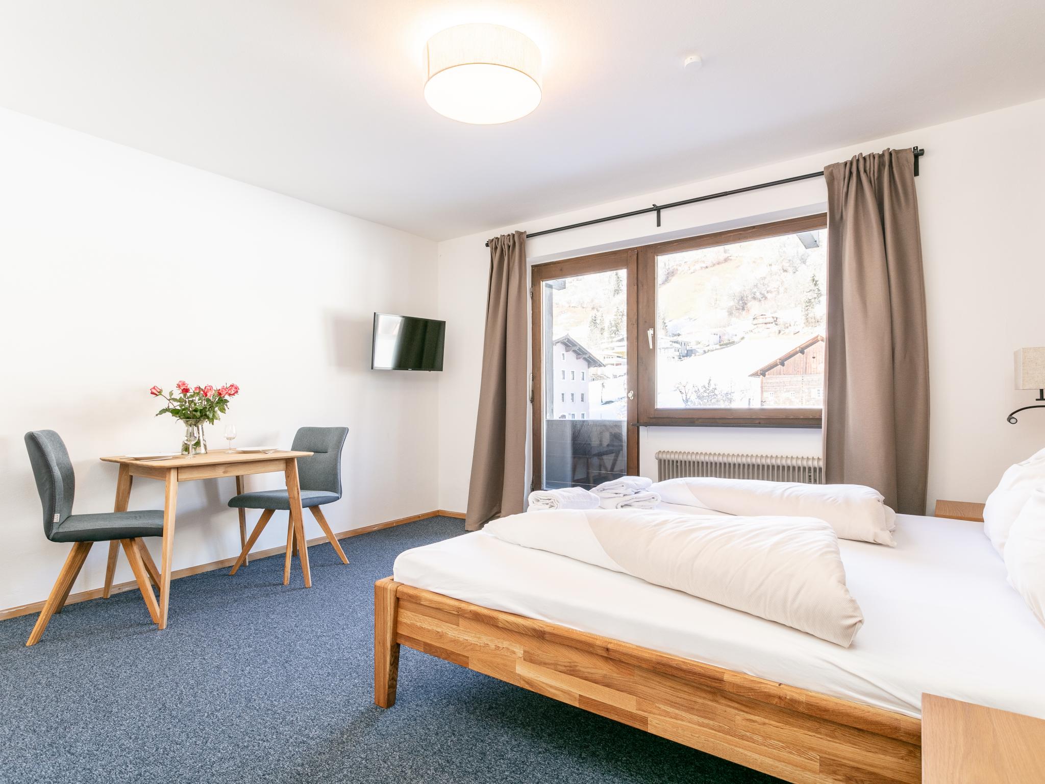 Bedroom with comfortable beds at Brixen Alpin Living Top 7 in Brixen