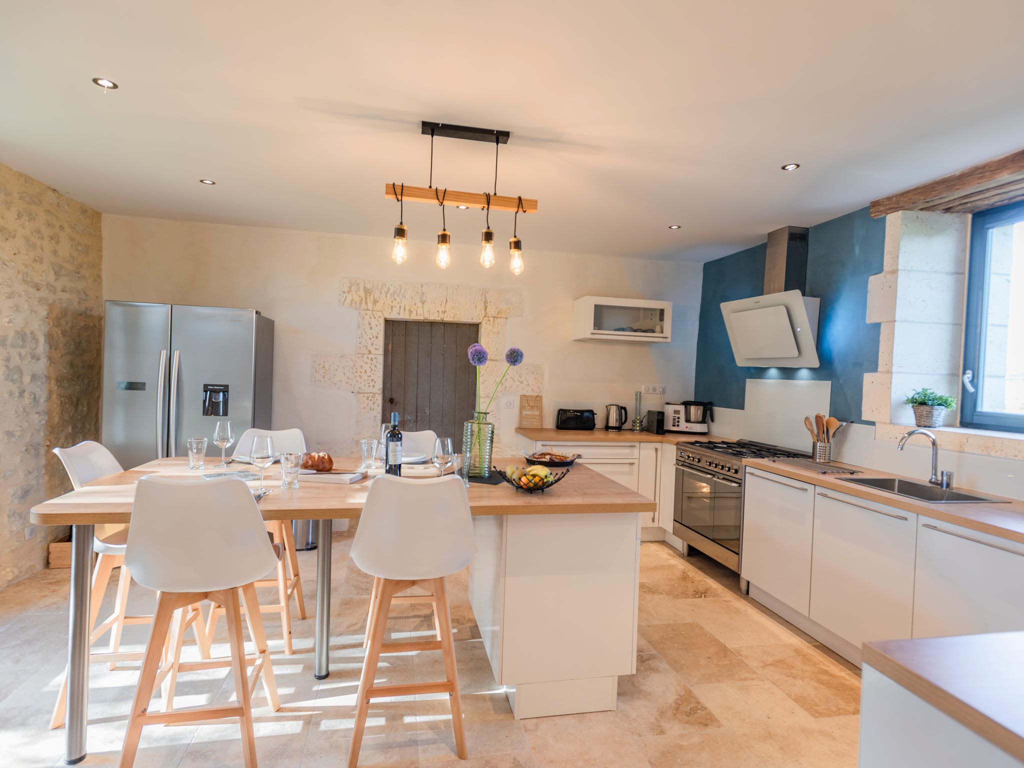 Modern kitchen at Les Ecures 2 in Champagne et Fontaine